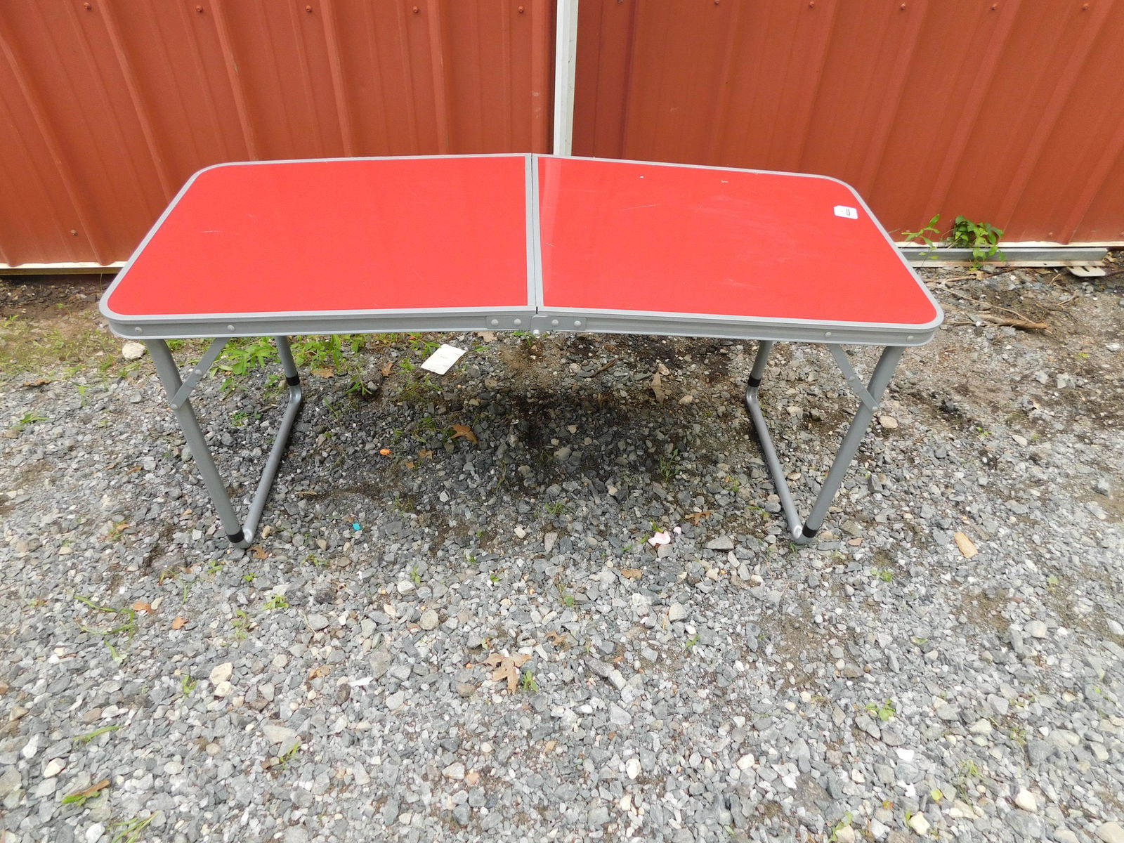 Folding Red Table with Extendable Legs (1 of 3)