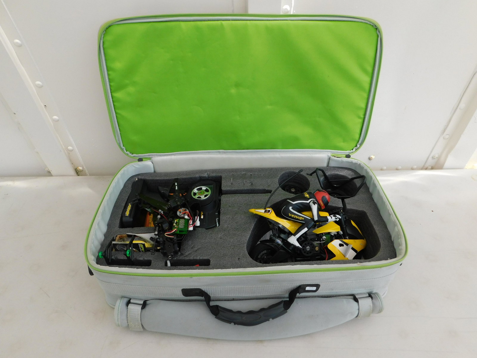 RC Venom GV-1 1:8 Scale Motorcycle with Carrying Case: RC Venom GV-1 1:8 Scale Motorcycle with Carrying Case. Comes with Radio Control extra body and extra parts. All RC items in this sale from a local estate and have not been checked to see if they are r