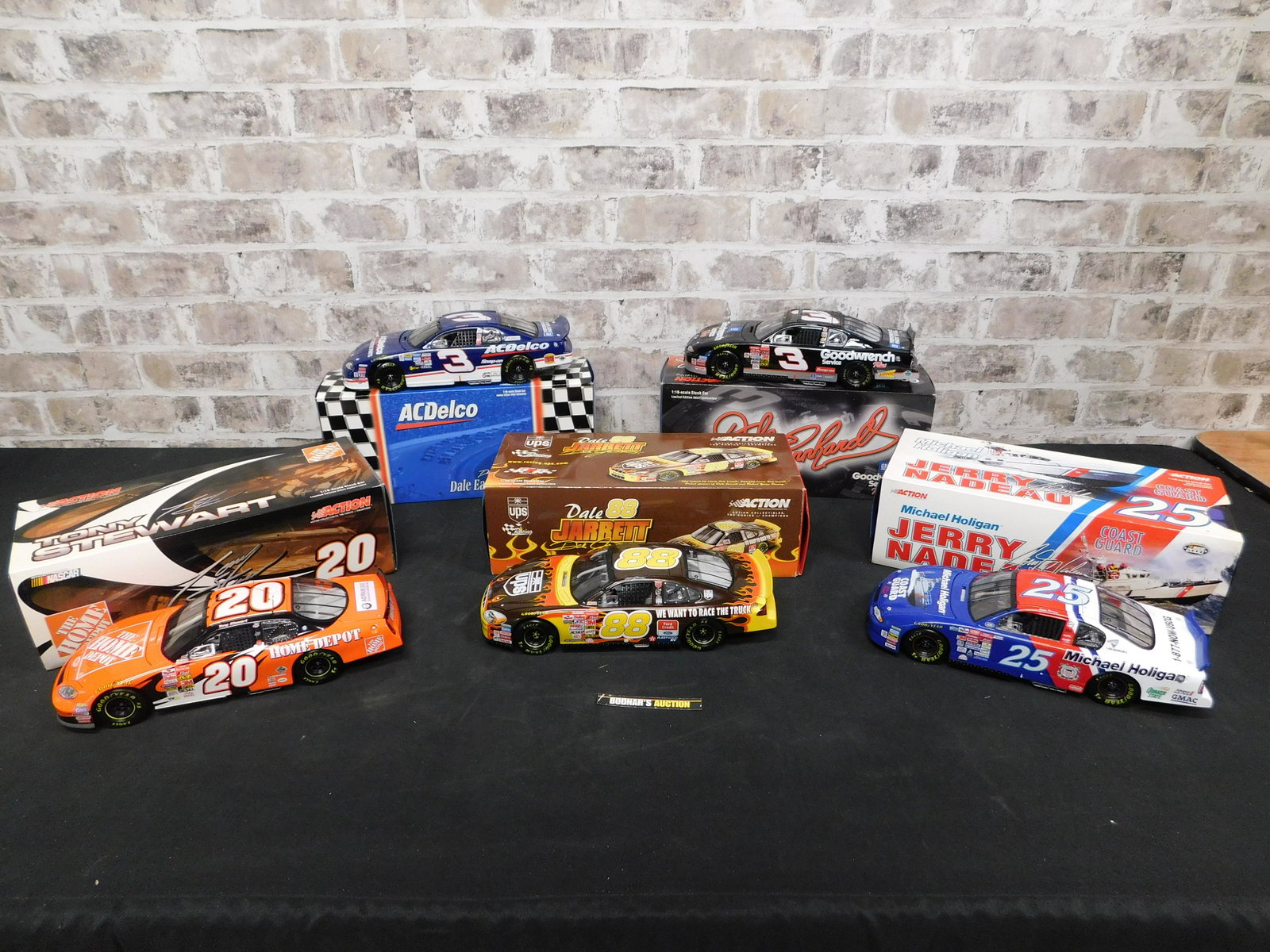 Lot of 5 Action Racing NASCAR 1:18 Scale Die-Cast Cars: Lot of 5 Action Racing NASCAR 1:18 Scale Die-Cast Cars. Included in this lot is Dale Earnhardt #3 GM Goodwrench Service Plus, Dale Jr. #3 ACDelco, Tony Stewart #20 Home Depot, Dale Jarrett #88 UPS/Rac