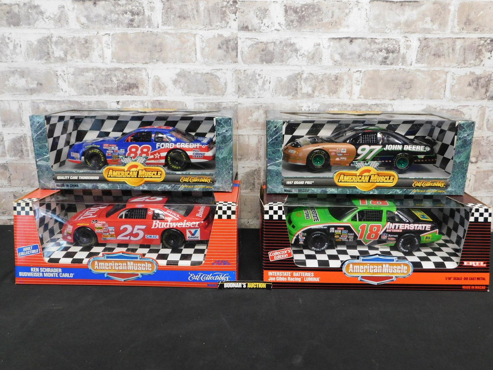Lot of 4 American Muscle NASCAR Die-Cast: Lot of 4 American Muscle NASCAR 1:18 Scale Die-Cast Cars. Included in this lot is 1997 Grand Prix - Chad Little, Quality Care Thunderbird - Dale Jarrett, Budweiser Monte Carlo - Ken Schrader, and Inte