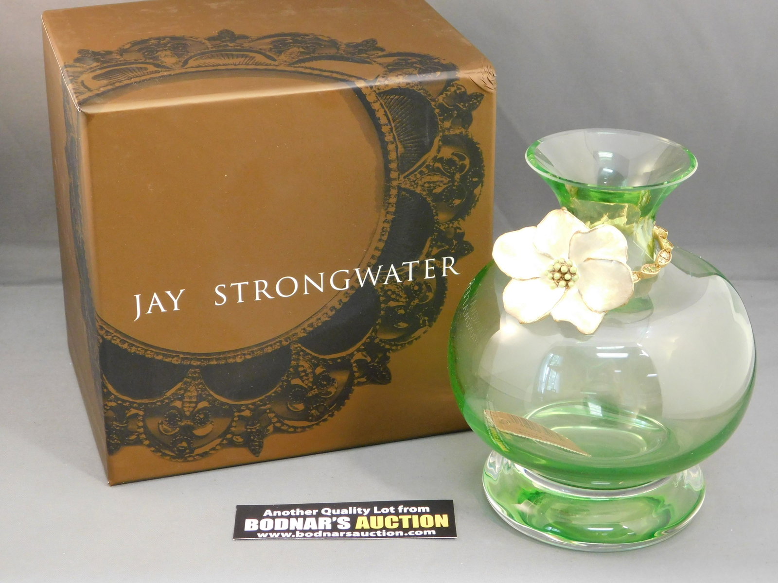 Jay Strongwater Camillia Vase in Green: Jay Strongwater Camillia Vase in Green. Comes in original box. Measures approx. 5.25" tall. All invoices must be paid within 24 hours of the sale. All items are shipped USPS and will be billed separat