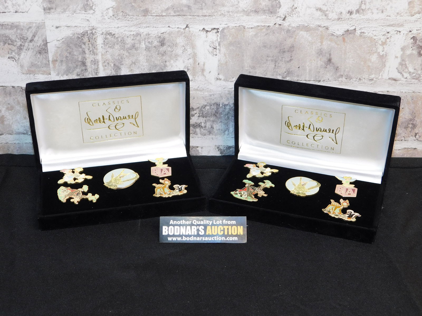 Lot of 2 WDCC 1999 Pin Sets: Lot of 2 WDCC 1999 Pin Sets. Pins included are Bambi, Daisy and Donald, Field Mouse, Tinker Bell, and Big Bad Wolf. All invoices must be paid within 24 hours of the sale. All items are shipped USPS an