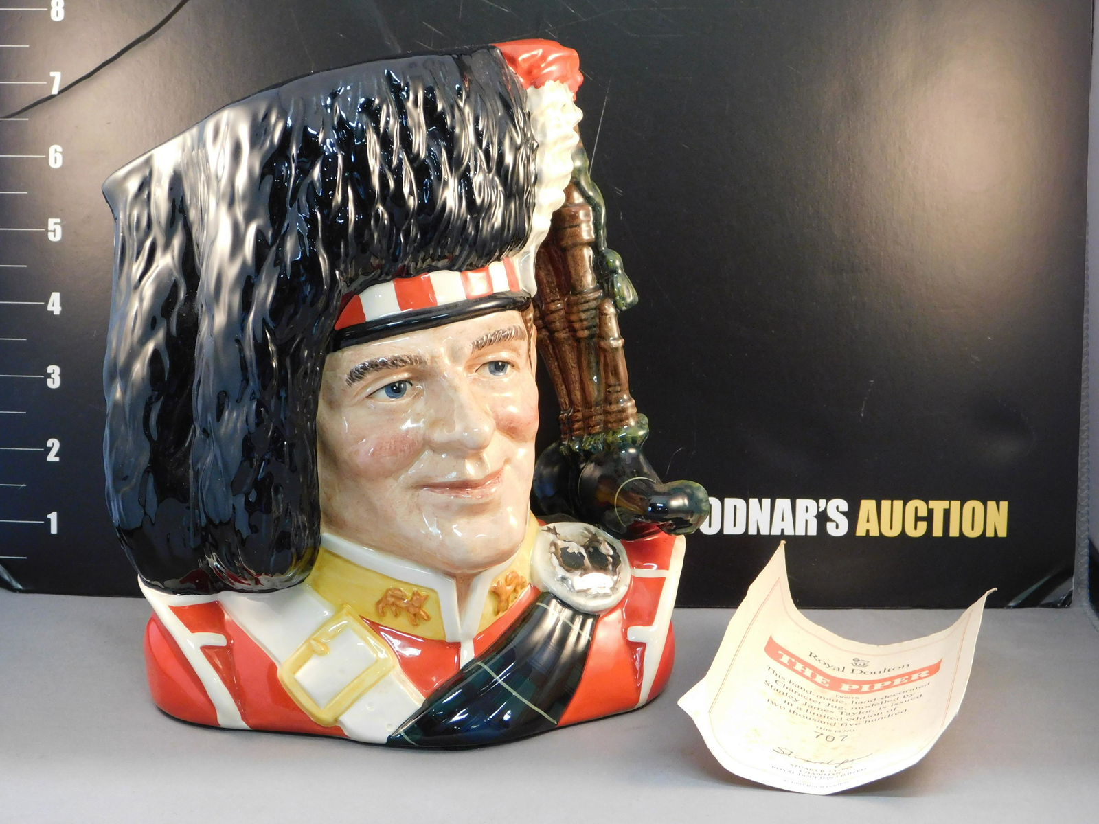 Royal Doulton The Piper Character Jug: Royal Doulton The Piper Character/Toby Jug. D6918. Dated 1992.Limited Edition #707/2500. Measures 6.75" tall x 7.25" wide. All invoices must be paid within 24 hours of the sale. All items are shipped