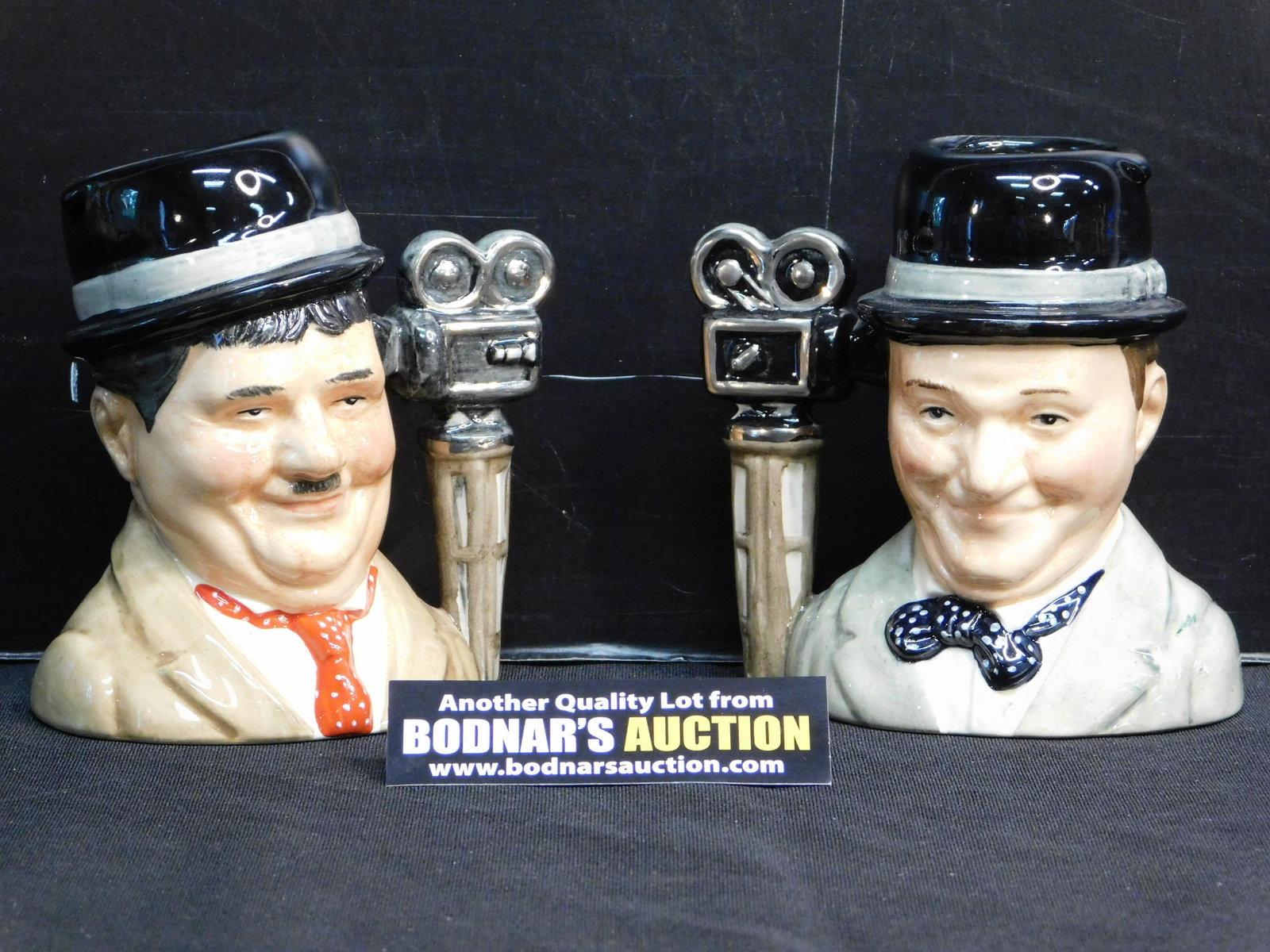 Laurel and Hardy Royal Doulton Character Jugs: Lot of 2 Royal Doulton Laurel and Hardy Small Character/Toby Jugs. Included in this lot are Oliver Hardy -D7009 dated 1995 Limited Edition 1607/3500 measuring 4.5" tall x 4.25" and Stan Laurel - D7008
