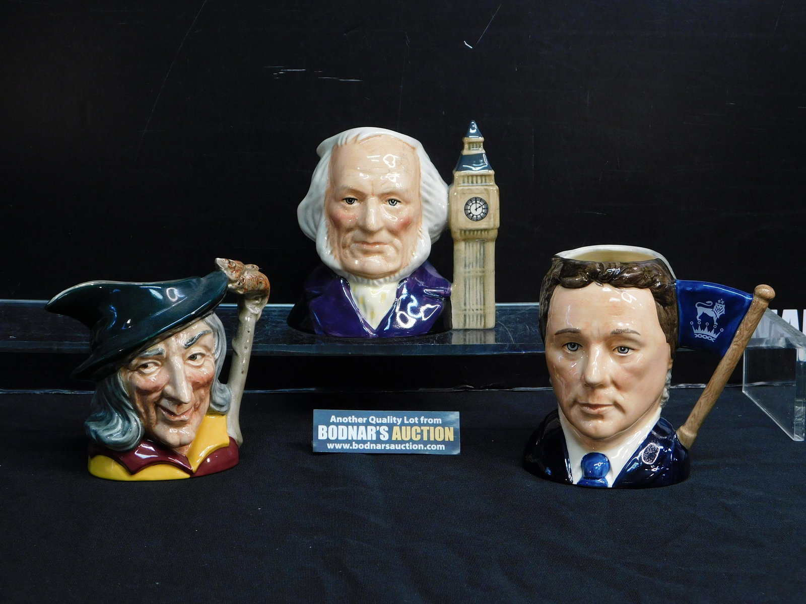 Lot of 3 Royal Doulton Small Character/Toby Jugs: Lot of 3 Royal Doulton Small Character/Toby Jugs. Included in this lot are John Doulton - D6656 dated 1980 measuring 4.5" tall x 4.5", Pied Piper - dated 1953 measuring 4.25" x 5" and Sir Henry Doulto