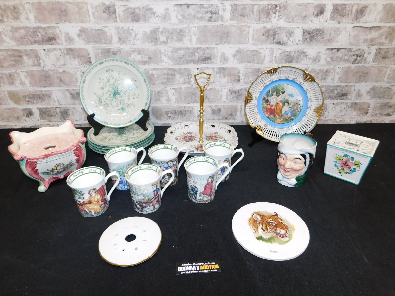 Lot of Porcelain including Noritake Salad Plates and: Lot of Porcelain including Noritake Salad Plates, Hand Painted Porcelain, Toby Mugs, and other Items. You are bidding at a live sale. Please read the terms and conditions. This sale will be broadcast 