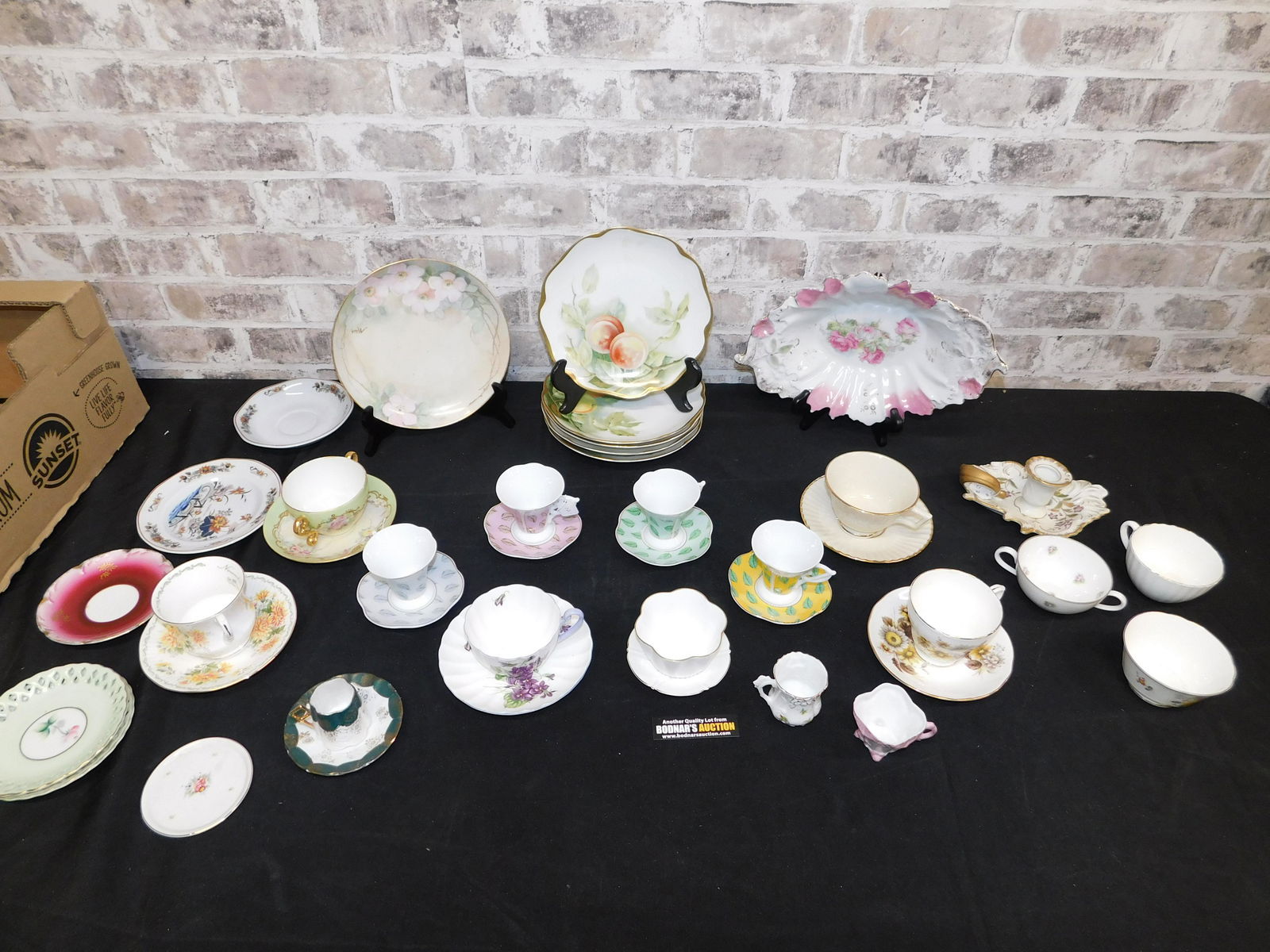 Group Lot of Cups, Saucers and Hand Painted Porcelain: Group Lot of Cups, Saucers and Hand Painted Porcelain including Shelley, Rosenthal, KPM, and More. You are bidding at a live sale. Please read the terms and conditions. This sale will be broadcast liv