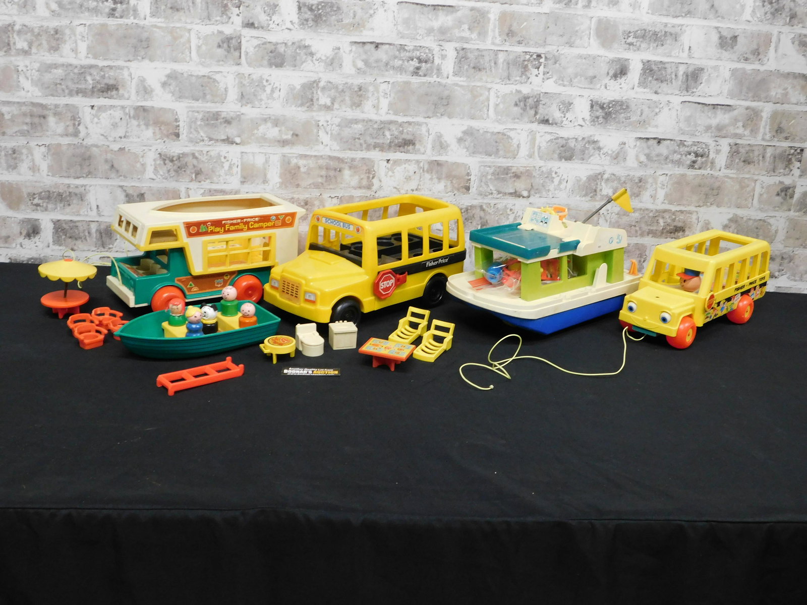 Lot of Vintage Fisher Price Toys: Lot of Vintage Fisher Price Toys including Yacht - One Piece as-is - with Accessories, Play Family Camper with Accessories and Figures, School Bus #192, and School Bus #2372, and Rowboat. Please read