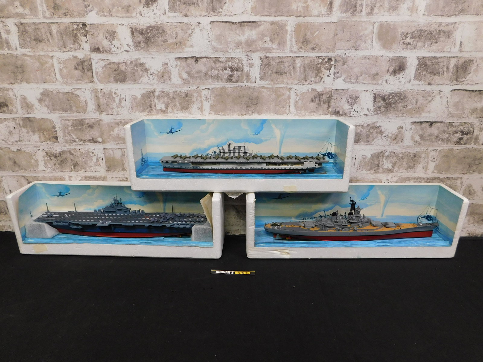 Lot of 3 Diecast US Navy Boats by Gearbox Collectibles: Lot of 3 Diecast US Navy Boats by Gearbox Collectibles. Including 2 Aircraft Carrier and 1 Battleship. In Original Styrofoam. Please read the terms and conditions. This sale will be broadcast live on 