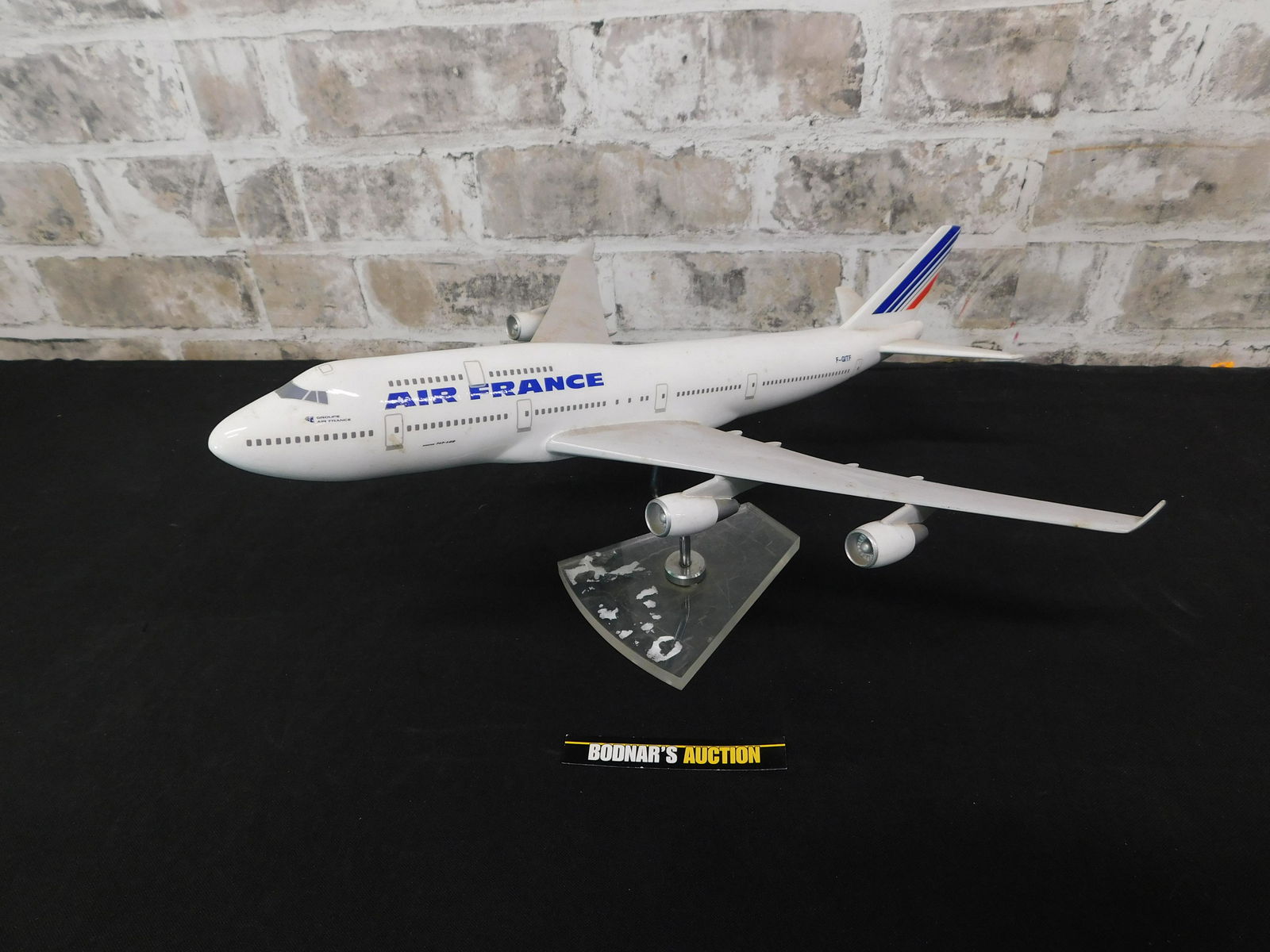 Air France Promotional Airplane Model on Stand: Air France Promotional Airplane Model on Stand. Please read the terms and conditions. This sale will be broadcast live on sale day with full descriptions of each lot being sold, as well as video feed