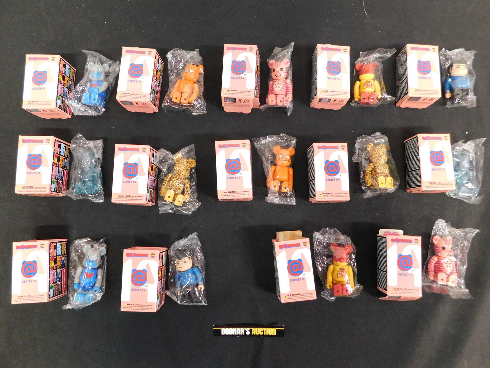 Lot of 14 Be@rbrick Keychains: Lot of 14 Be@rbrick Keychains. Series 19. Many Different Variations. Please read the terms and conditions. This sale will be broadcast live on sale day with full descriptions of each lot being sold, a