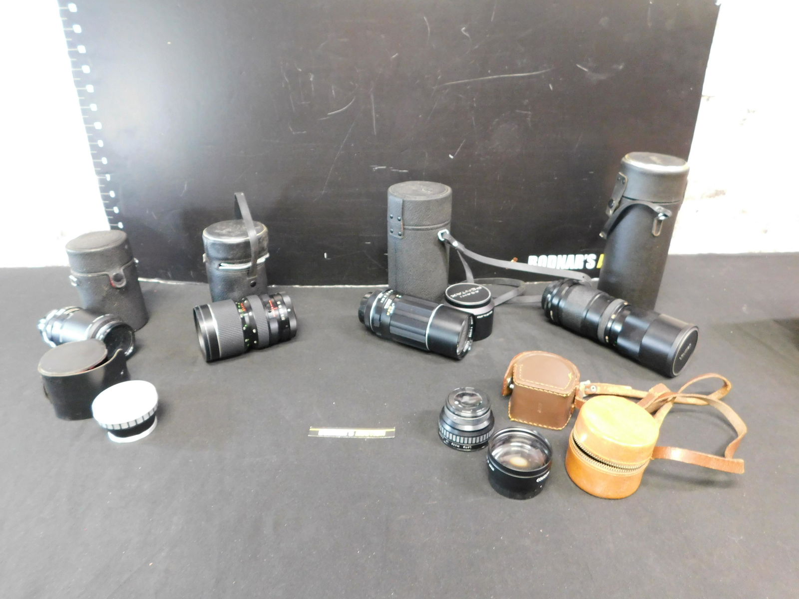 Group Lot of Vintage Lenses: Group Lot of Vintage Lenses. Including Asahi Pentex, Takumar 200 mm, Hoya 67 mm, Vivitar 205 Tele zoom, Cologin 2 mm, and More. Please read the terms and conditions. This sale will be broadcast live o