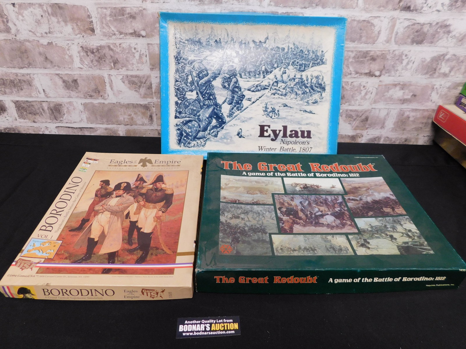 Lot of 3 Napoleon War Strategy Games: Lot of 3 Napoleon War Strategy Games including Eylau - Napoleon's Winter Battle 1807 by GDW, Eagles of the Empire Borodino Vol. 1 by GamesUSA, and The Great Redoubt by Yaquinto Games. All appear to be