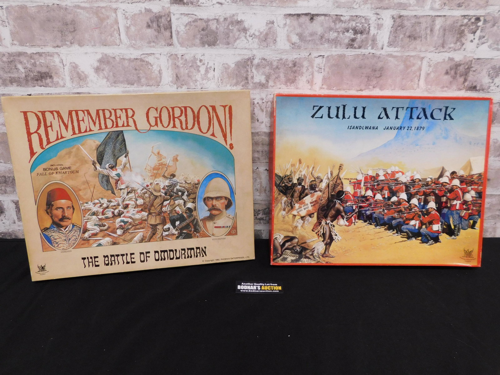 Lot of 2 War Strategy Games: Lot of 2 War Strategy Games by Phoenix Enterprises Limited including Remember Gordon! and Zulu Attack - Some notes are written on the papers. Both appear to be in Good/Used Condition, Please refer to 