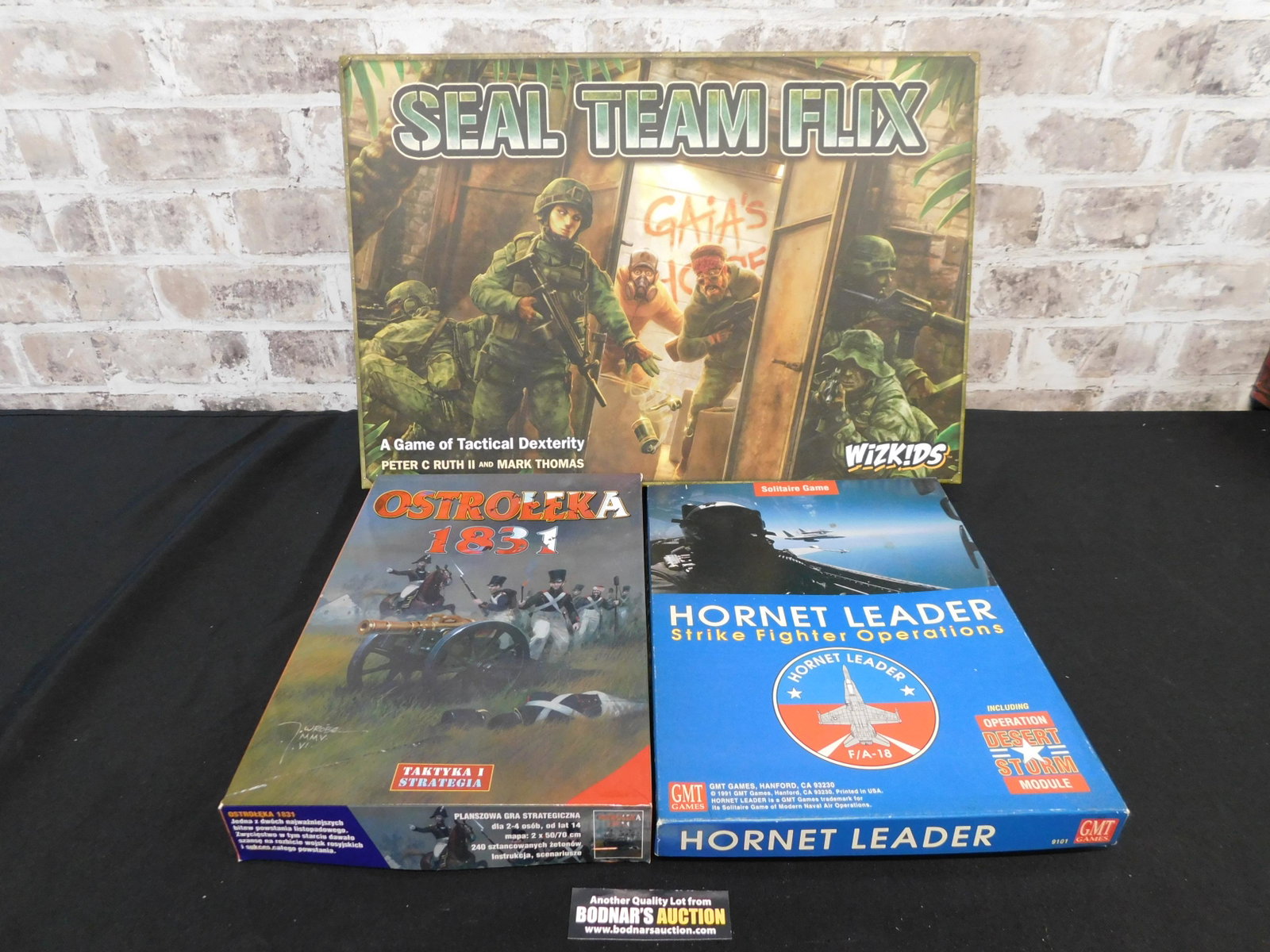 Lot of 3 War Strategy Games: Lot of 3 War Strategy Games including Ostroleka 1831 Gra Strategiczna - Excellent/Unused Condition, Hornet Leader - Strike Fighter Operations by GMT - Very Good/Used Condition, and Seal Team Flix by W