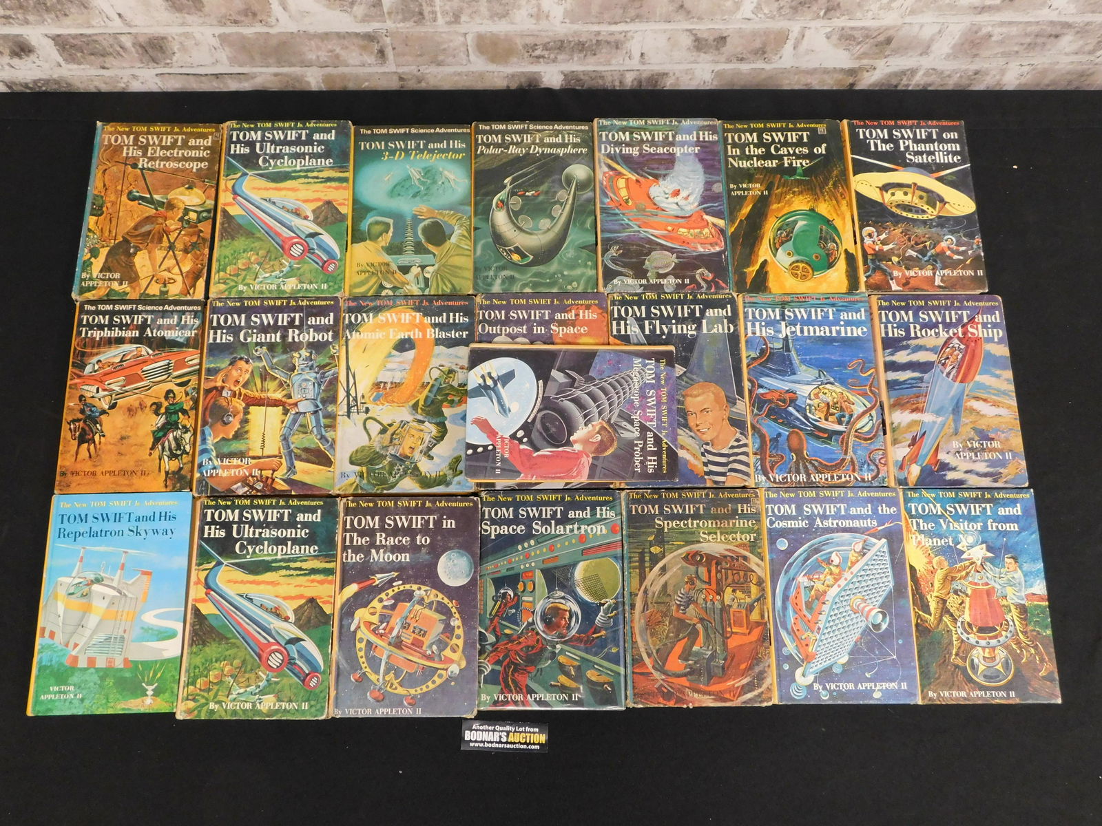 Lot of 22 Tom Swift Adventures Vintage Books: Lot of 22 Tom Swift Adventures Vintage Books. Please read the terms and conditions. This sale will be broadcast live on sale day with full descriptions of each lot being sold, as well as video feed of