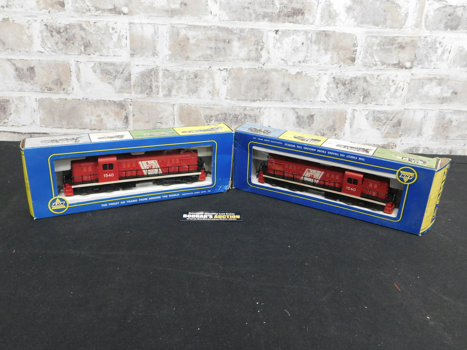 Lot of 2 Diesel HO Scale AHM Trains: Lot of 2 Diesel HO Scale AHM Trains including a Locomotive and Dummy Central Railroad Company #1540. Please read the terms and conditions. This sale will be broadcast live on sale day with full descri