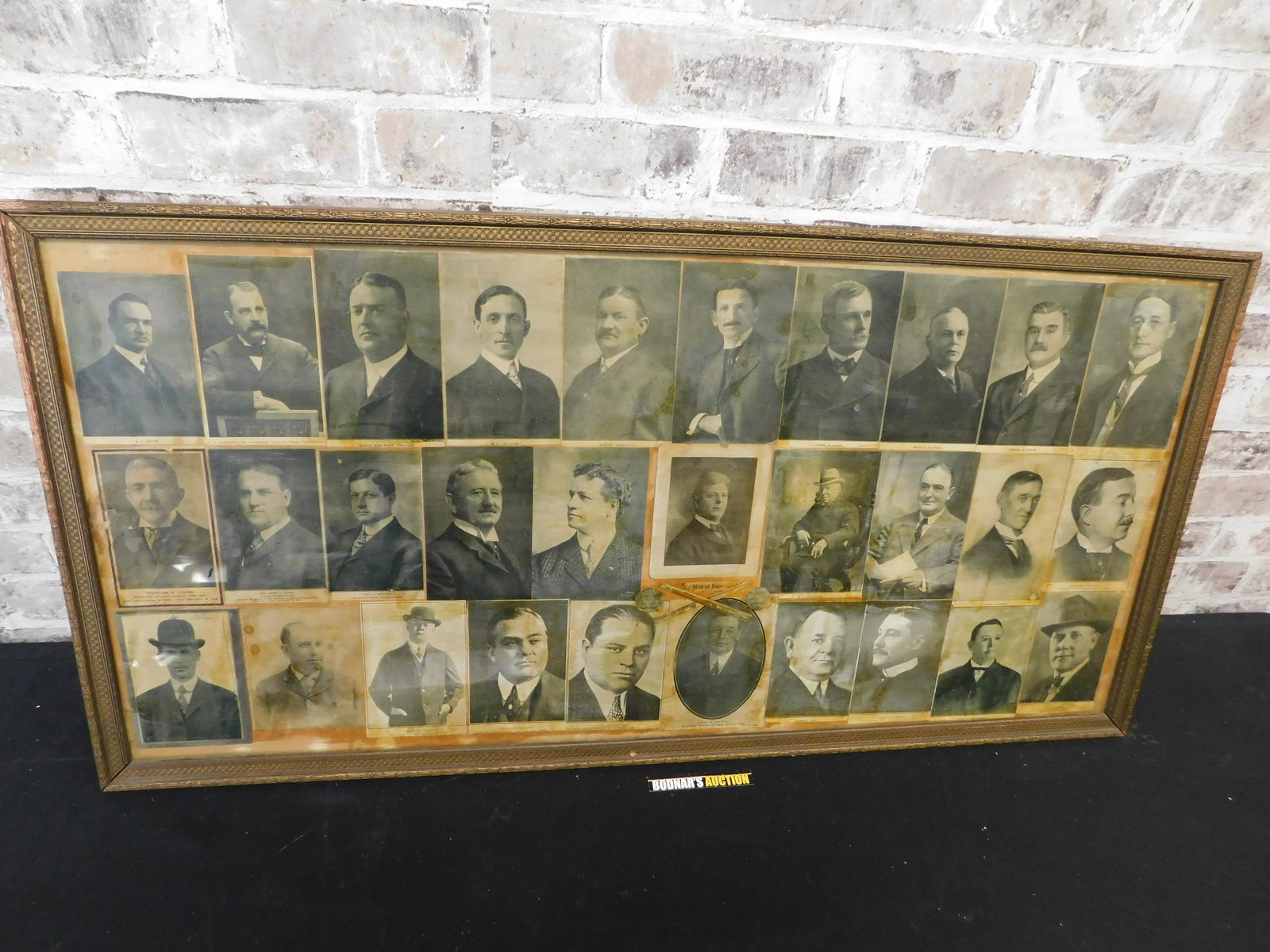 Framed Copy of a Collage of Portraits of Baseball: Framed Copy of a Collage of Portraits of Baseball Owners and Executives c.1910. Measures 20" tall x 39.5" wide. Some water spots. All lots in this auction came from the Historic McGreevy's Sports Bar