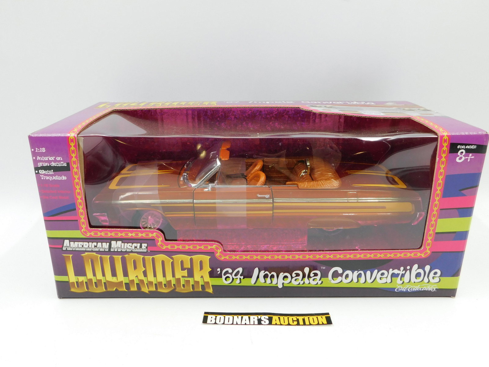 American Muscle Lowrider '64 Impala Convertible: American Muscle Lowrider '64 Impala Convertible. 1:18 Scale Diecast. Comes in Original Box. All invoices must be paid within 24 hours of the sale. All items are shipped USPS or UPS and will be billed