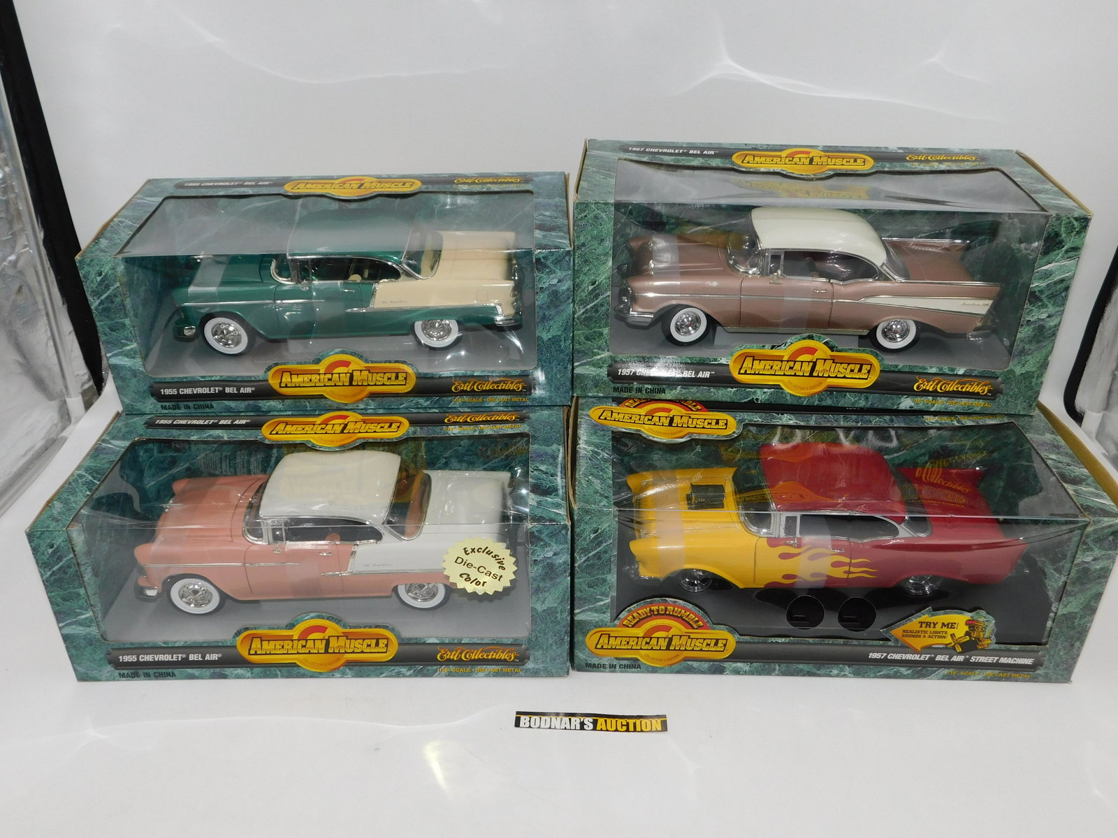 Lot of 4 American Muscle Chevrolet Bel Air Diecast Cars: Lot of 4 American Muscle Chevrolet Bel Air Diecast Cars including (2) 1955 Chevrolet Bel Air (Green and Pink), 1957 Chevrolet Bel Air and 1957 Chevrolet Bel Air Street Machine. 1:18 Scale Diecast. Com