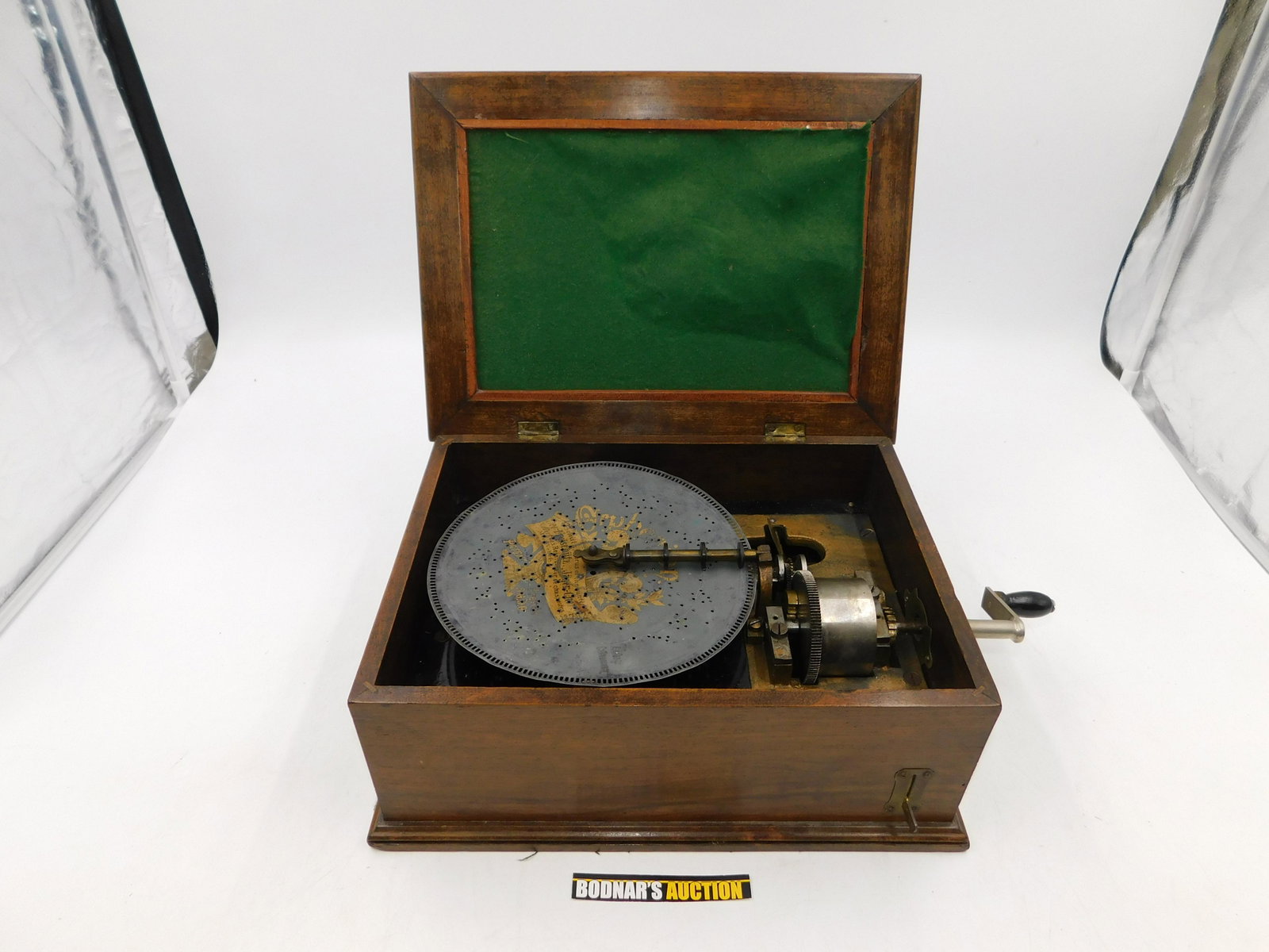 19th Century Disk Player Music Box: 19th Century Disk Player Music Box. In running order. Has all its teeth. Comes with 1 8" disk. Could use some minor adjustments. Measures approx. 6" tall x 14" wide. Please read the terms and conditio