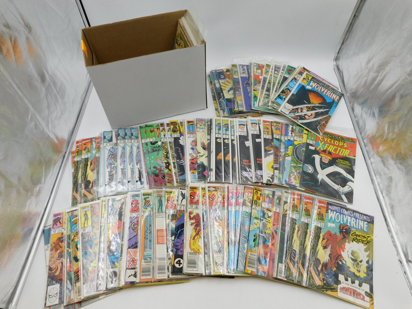Short Box of Marvel Comics: Short Box of Comics including 70's-90's Marvel Comics Presents, Marvel Tales, Marvel Team-Ups and More. Please read the terms and conditions. This sale will be broadcast live on sale day with full des