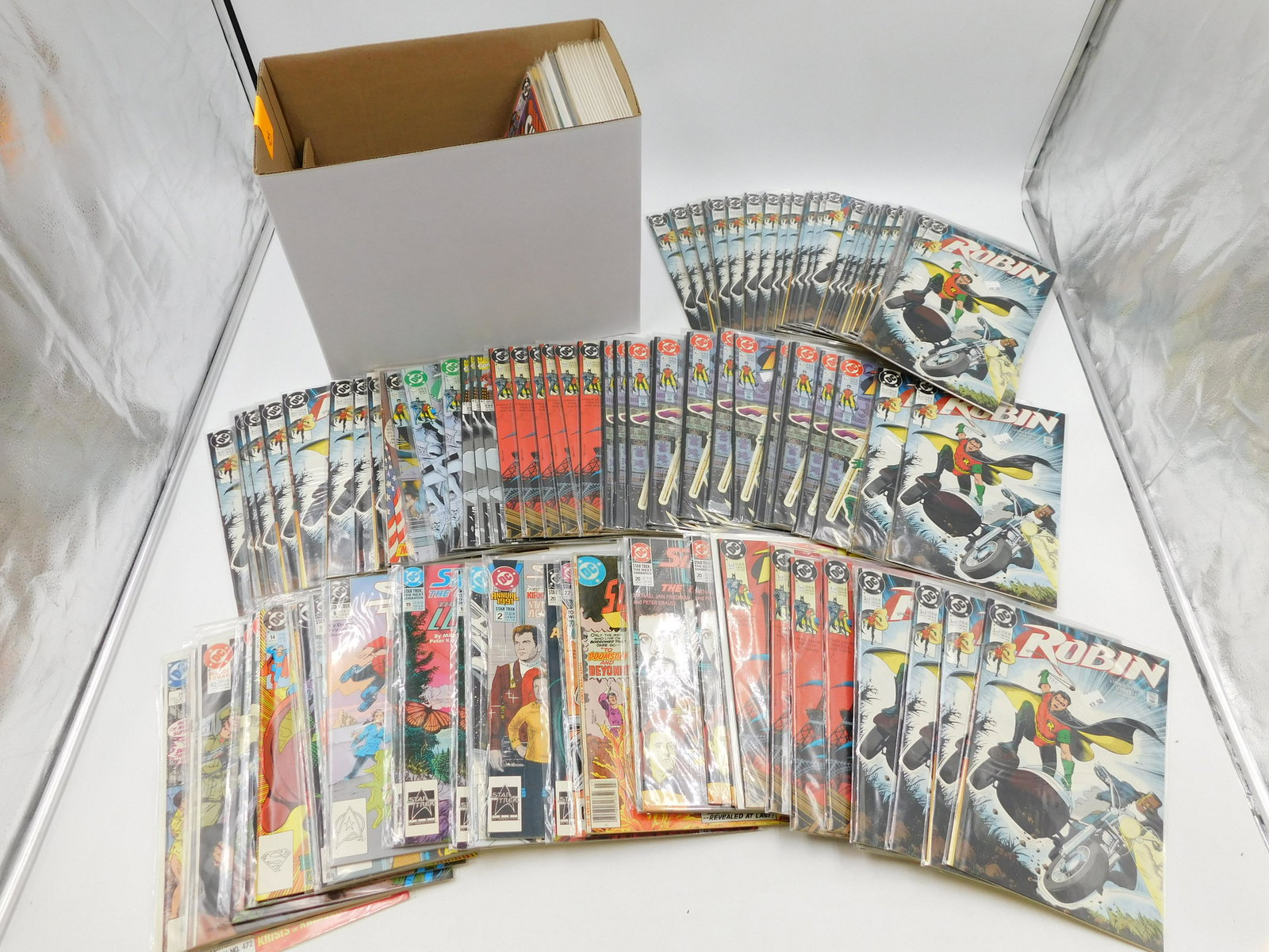 Short Box of DC Comics: Short Box of DC Comics from 60's-90's including Robin, Superman's Pal Jimmy Olsen and More. Please read the terms and conditions. This sale will be broadcast live on sale day with full descriptions of