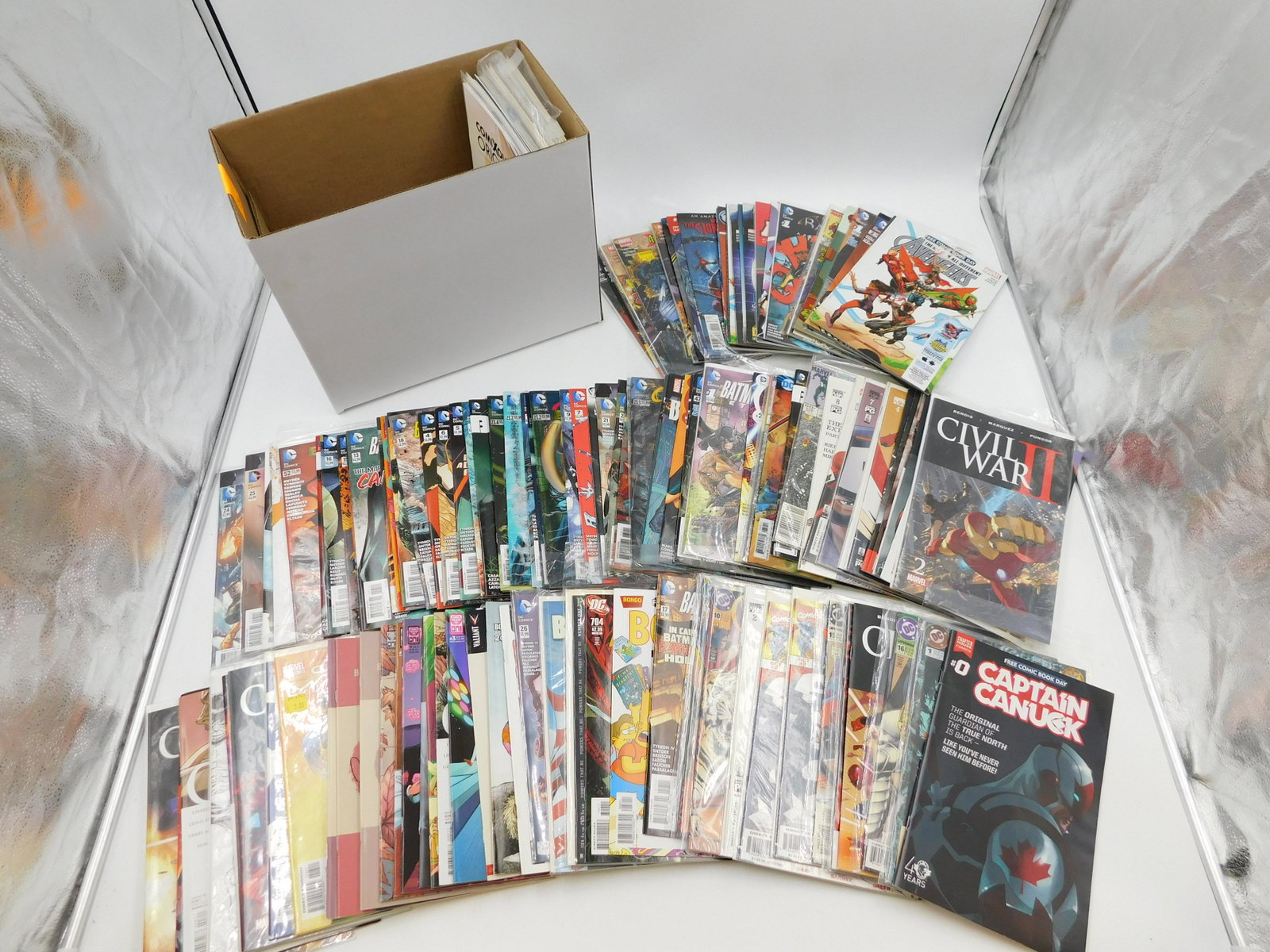 Short Box of Comics: Short Box of Comics including Amazing Spider-Man, Lenticular Covers, Batman, Civil War Captain America and More Please read the terms and conditions. This sale will be broadcast live on sale day with 