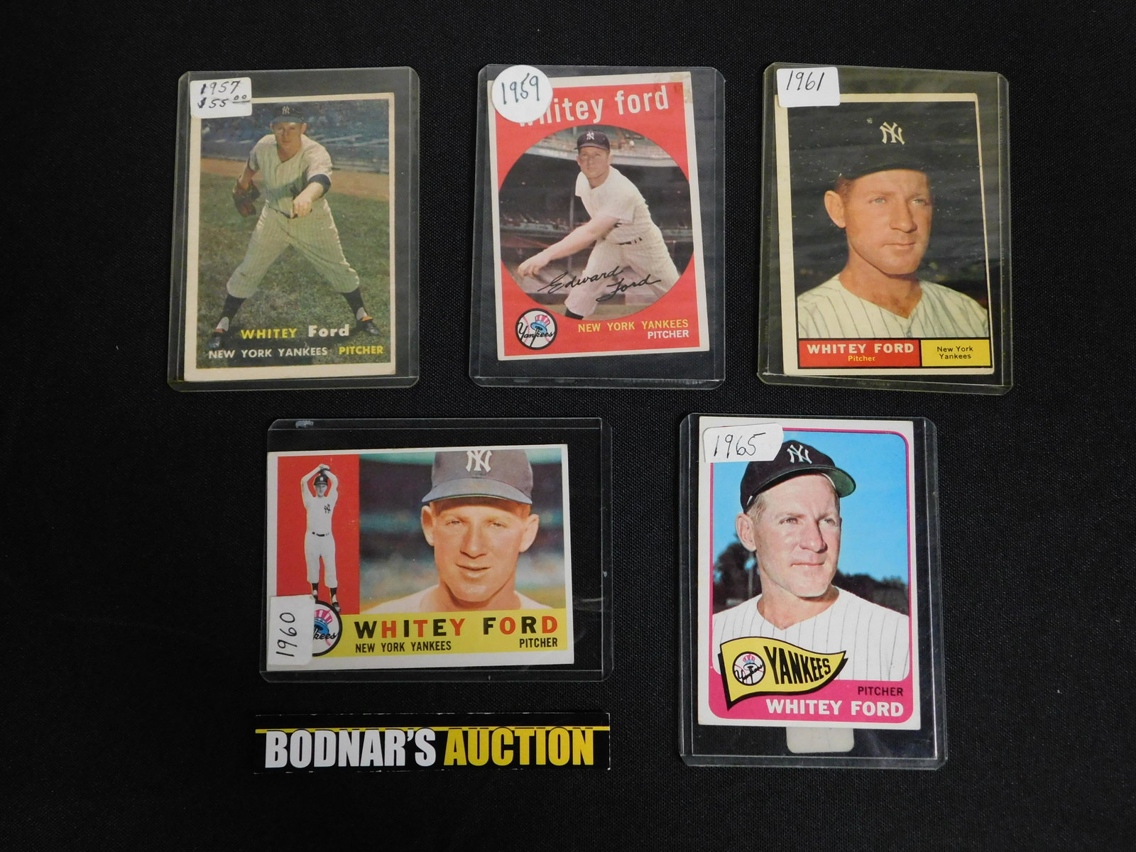 Lot of 5 Whitey Ford Baseball Cards: Lot of 5 Whitey Ford Baseball Cards including 1957 Topps #25, 1959 Topps #430, 1960 Topps #35, 1961 Topps #160, and 1965 Topps #330. All items are shipped USPS or UPS and will be billed separately. A 