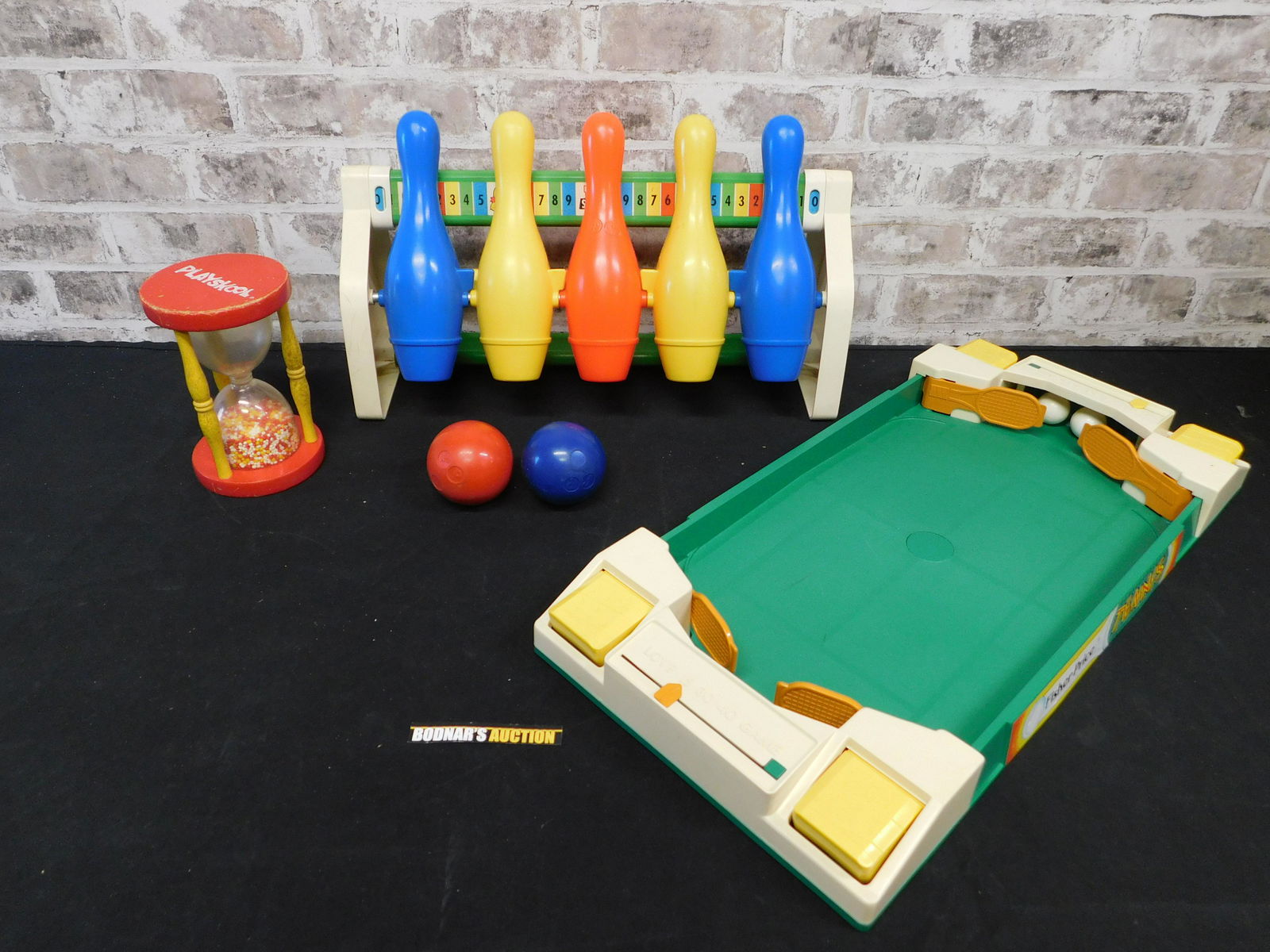 Lot of Playskol and Fisher Price Toys: Lot of Playskol and Fisher Price Toys including Hourglass, Bowling, and Tennis. All items are shipped USPS or UPS and will be billed separately. A $10 handling fee is added to the shipping price per l