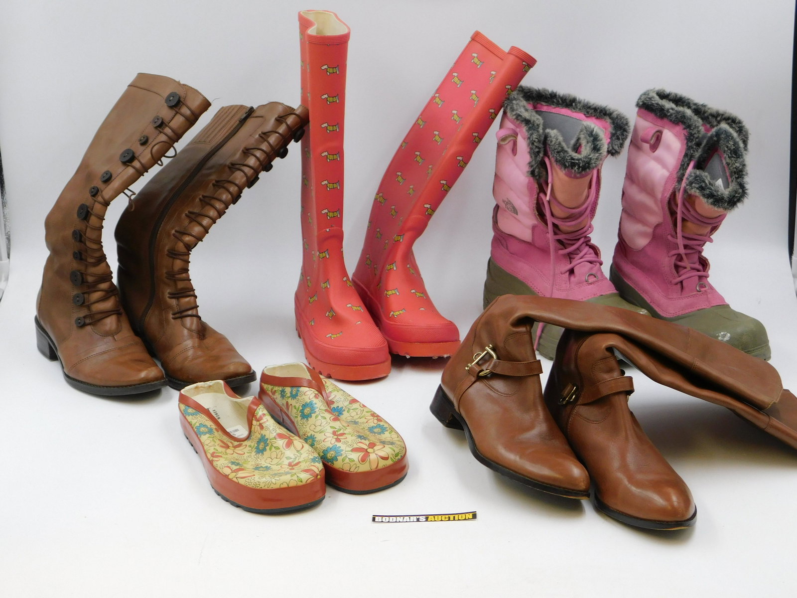 Lot of Various Women's Boots/Shoes: Lot of Various Women's Boots/Shoes. Including Northface Snow Boots, Via Spiga Brown Leather Riding Boots, Matisse Brown Leather Riding Boots, Gardening Shoes and More. Used Condition. This sale will b