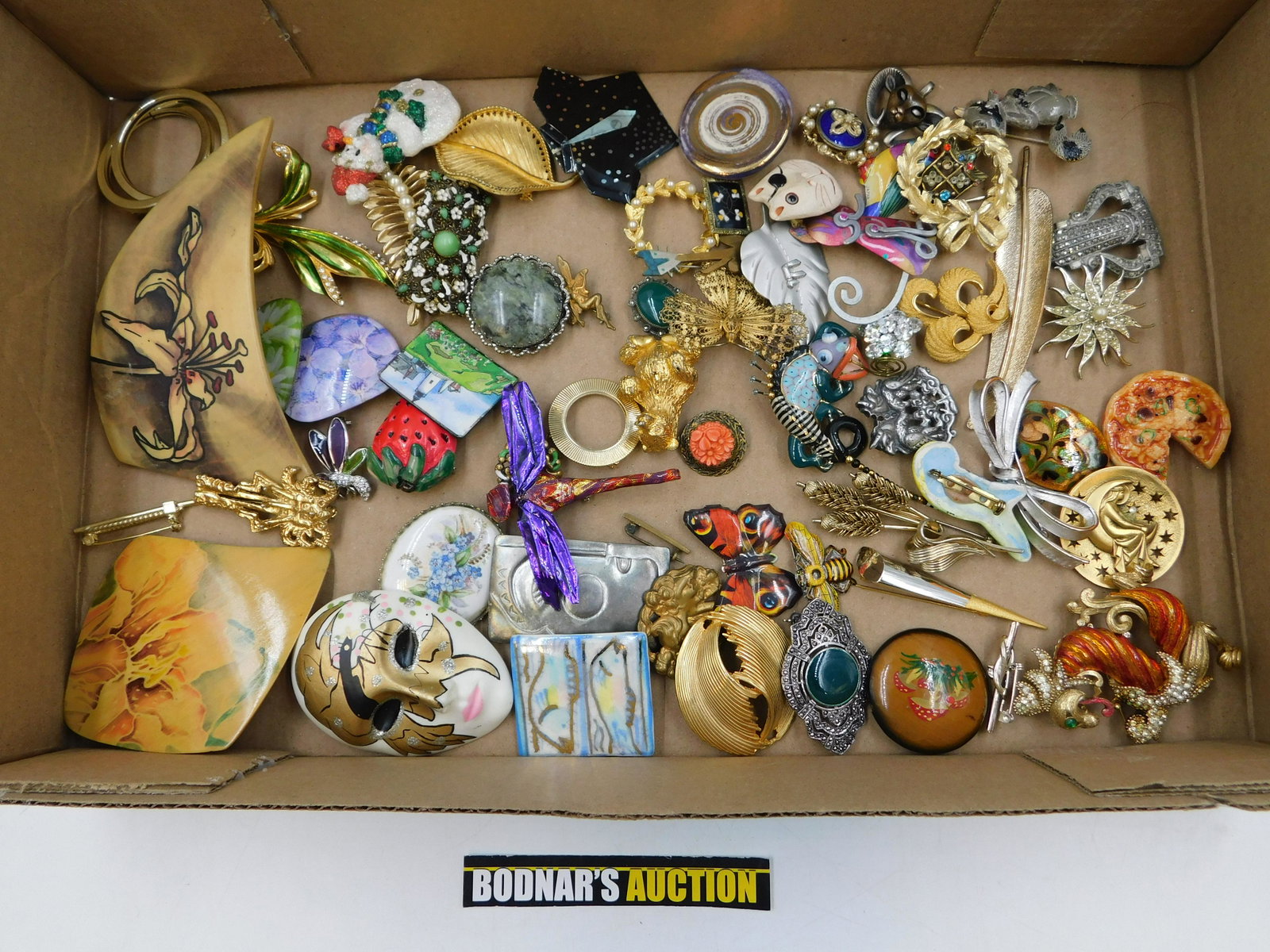 Lot of Costume Pins: Lot of Costume Pins. Including Marcasite, Enamel and Rhinestone Dragon Signed Mer, Filagree, and More. This sale will be broadcast live on sale day with full descriptions of each lot being sold. All i