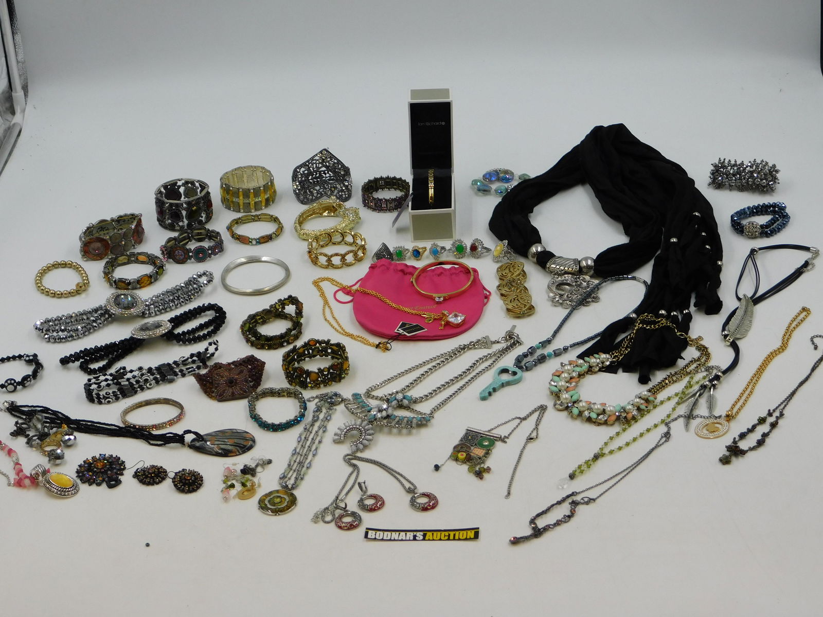 Lot of Rhinestone and Crystal Costume Jewelry: Lot of Rhinestone and Crystal Costume Jewelry including many bangles, Necklaces, Rings, and More. This sale will be broadcast live on sale day with full descriptions of each lot being sold. All items