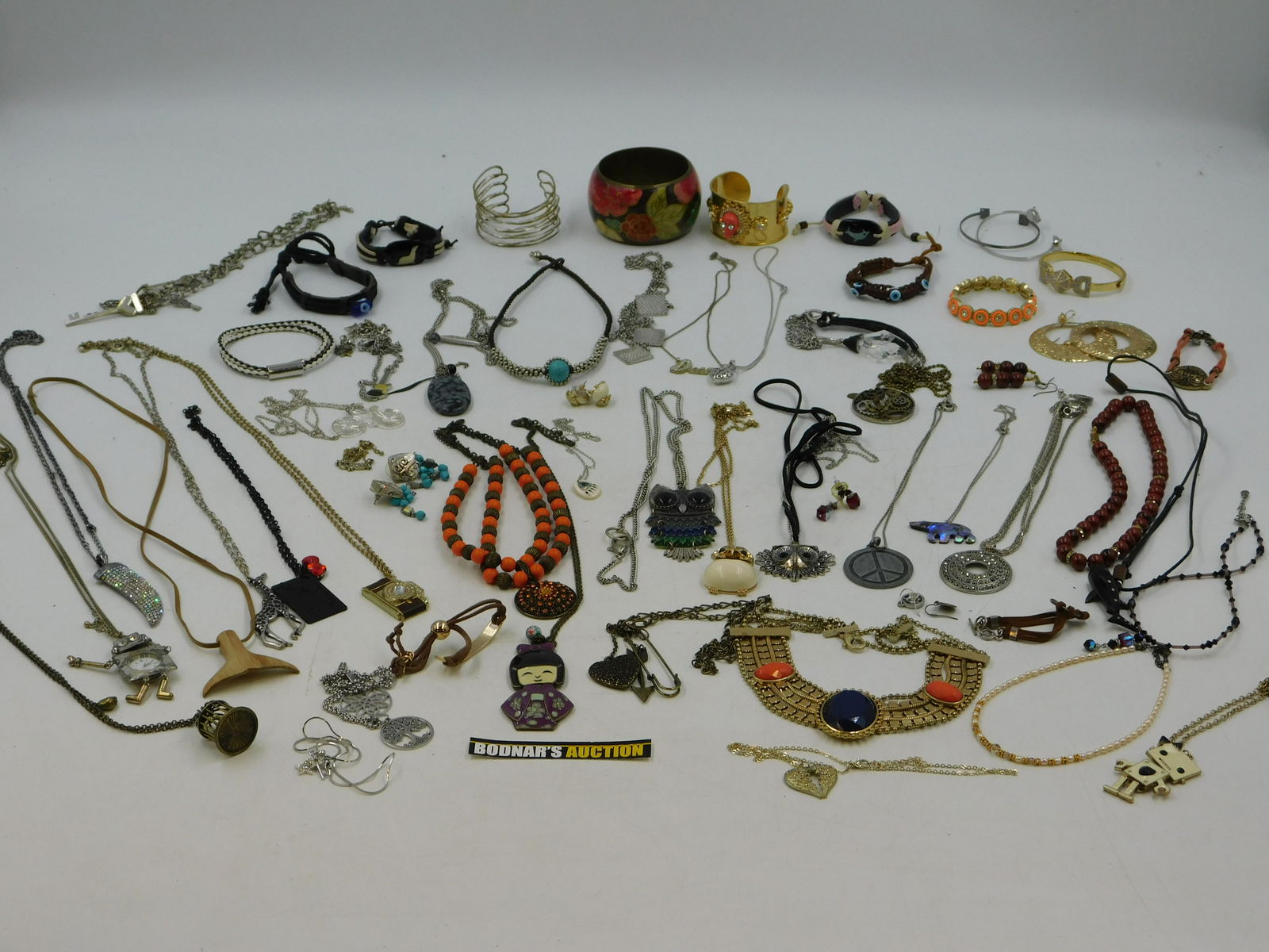 Lot of Costume Jewelry: Lot of Costume Jewelry including Cuffs, bangles, and Many Unique Pieces. This sale will be broadcast live on sale day with full descriptions of each lot being sold. All items MUST be paid for within 2