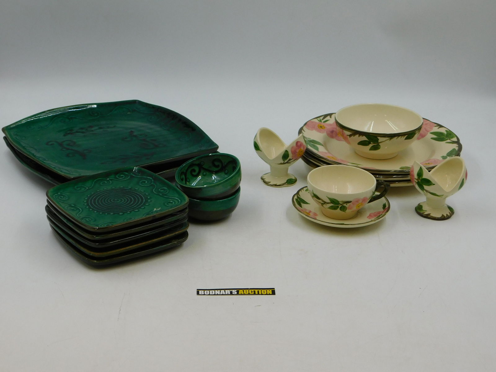 Lot of Pottery: Lot of Pottery including Franciscan Ware, Unsigned Green Pottery Dinnerware and More. This sale will be broadcast live on sale day with full descriptions of each lot being sold. All items MUST be paid
