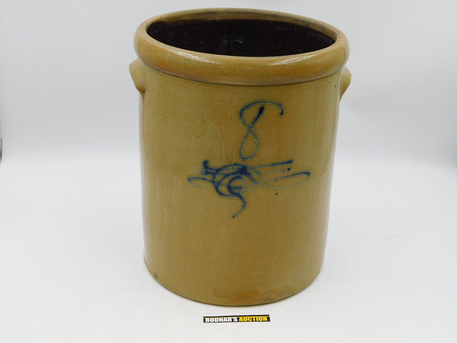 Oversized Crock: Oversized Crock with Blue 8 and Scroll on Front. Measures 15.75" tall x 13" wide. This sale will be broadcast live on sale day with full descriptions of each lot being sold. All items MUST be paid for