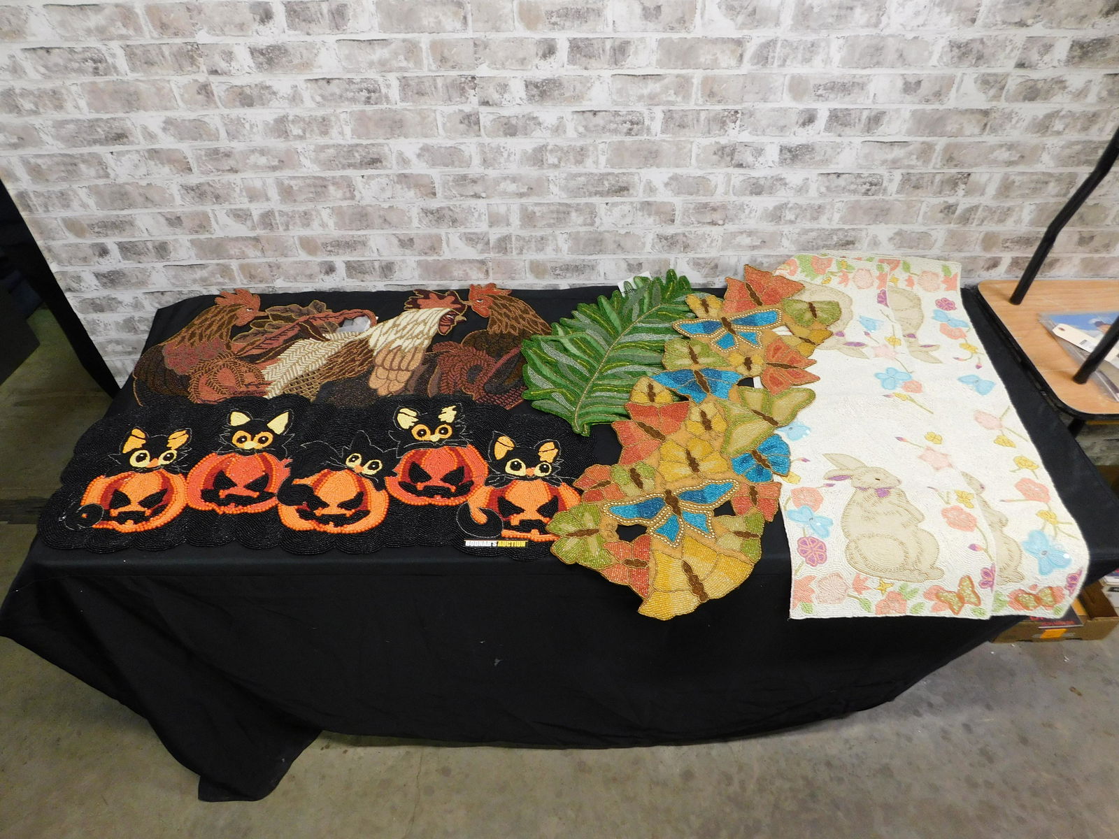Group Lot of Beaded Placemats and Table Runners: Group Lot of Beaded Placemats and Table Runners including Halloween, Butterflies, Leaves, Easter, Roosters and More. Various Makers including Issac Mizrahi, Kim Seibert and More. Measures 20" - 40" lo