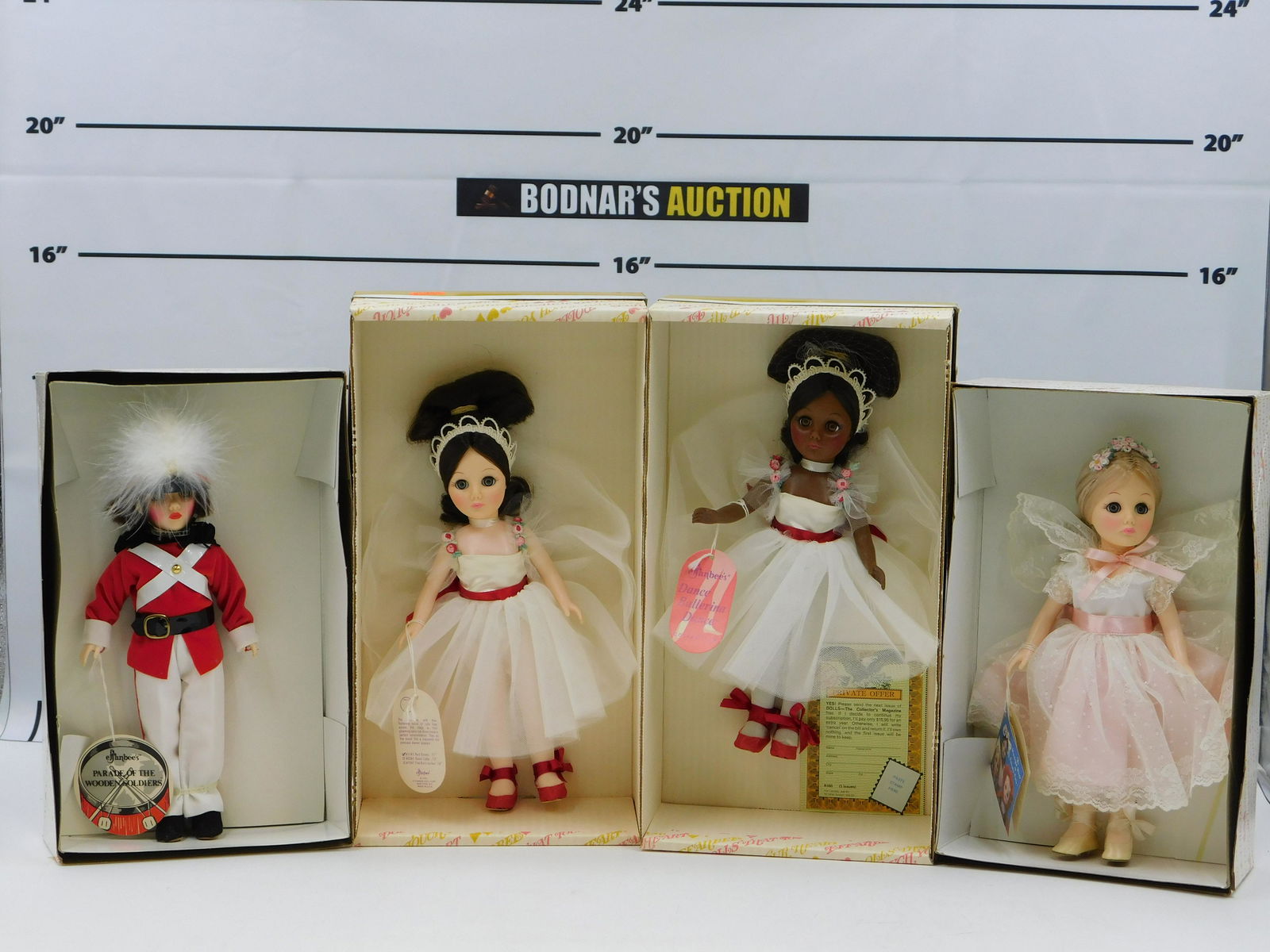 Lot of 4 Effanbee Dolls: Lot of 4 Effanbee Dolls including Ballerina - Red Shoes, Ballerina - Red Shoes (African American), Sugar Plum Fairy, and Toy Soldier. They all measure 11" and come in Original Boxes. This sale will be