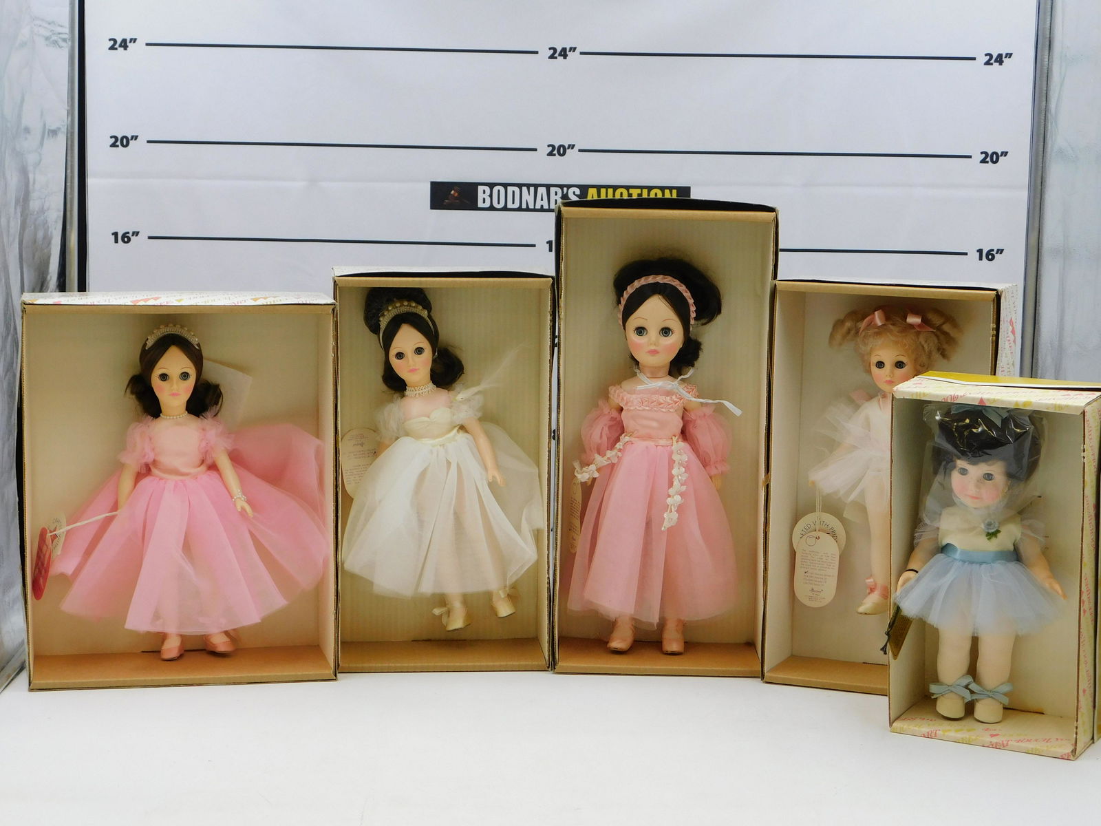 Lot of 5 Effanbee Dolls: Lot of 5 Effanbee Dolls including Dancing School - 11", Nutcracker - 15", Tuesday's Child - 11", Nadia - 13" and Swan Lake - 13". They all come in Original Boxes. This sale will be broadcast live on s