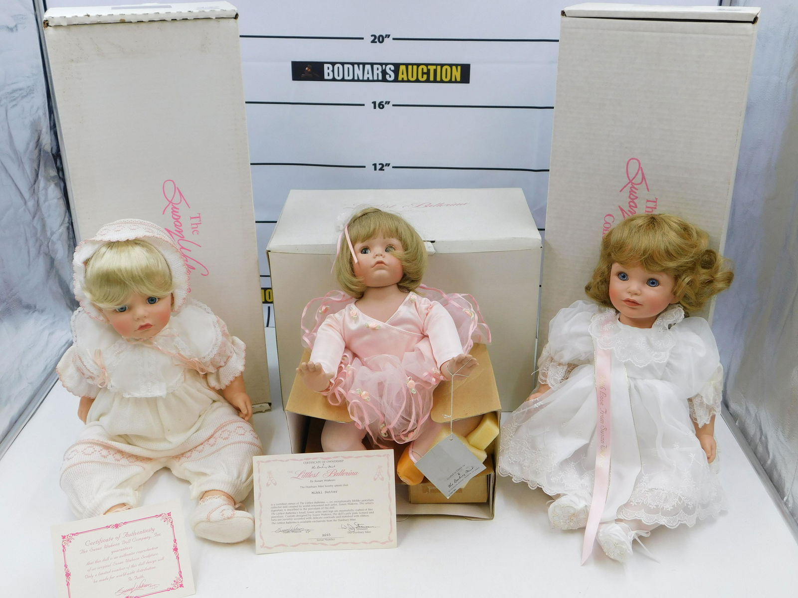 Lot of 3 Susan Wakeen Collection and Danbury Mint Dolls: Lot of 3 Susan Wakeen Collection and Danbury Mint Realistic Dolls including Perfect Angel, Mary Anne, and Littlest Ballerina. They all come in the original boxes. They measure 10" - 18". This sale wil