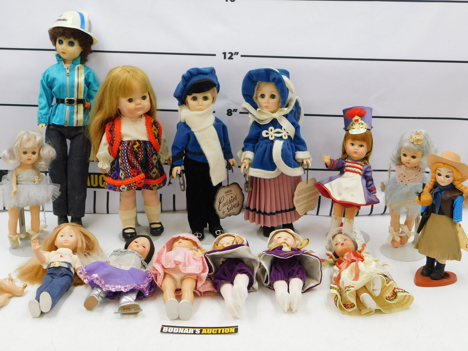 Group Lot of Loose Dolls: Group Lot of Loose Dolls including Many Ginny Dolls, Effanbee, and Telephone People. All invoices must be paid within 24 hours of the sale. All items are shipped USPS or UPS and will be billed separat