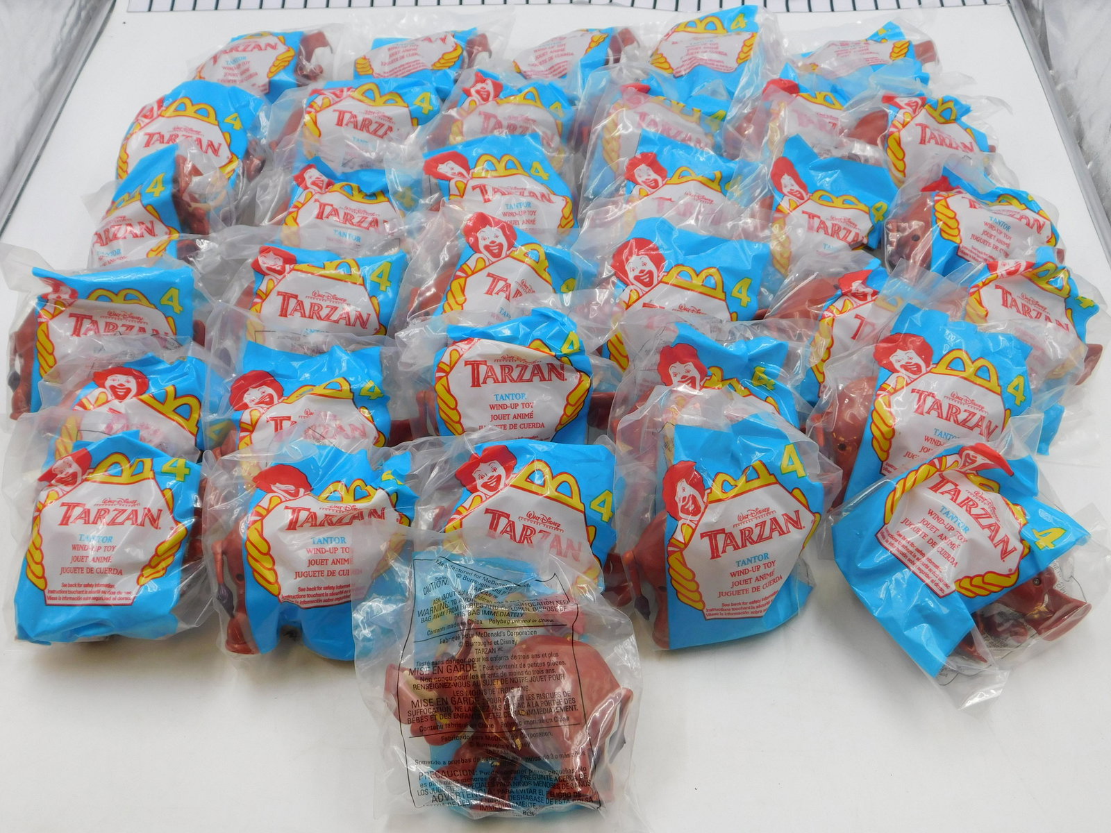 Large Lot of Tarzan McDonald's Toys: Large Lot of Tarzan McDonald's Toys. All invoices must be paid within 24 hours of the sale. All items are shipped USPS or UPS and will be billed separately. A $10 handling fee is added to the shipping