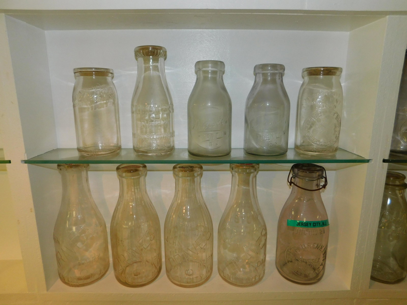 Lot of 10 New Jersey Dairy Bottles: Lot of 10 NJ Dairy Bottles including Amethyst Drennen Dairy - Jersey City, Decker's Dairy - Hightstown, C. Decker's Dairy - Hightstown, Clover Leaf Dairy - Asbury Park - multiple chips, (2) De Coul. C