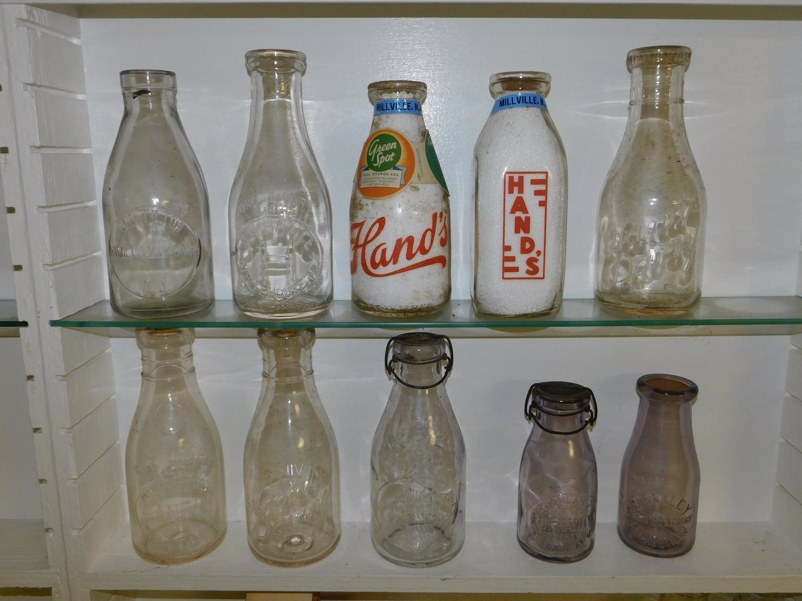Lot of 10 NJ Dairy Bottles: Lot of 10 NJ Dairy Bottles including E Hanley - Elizabeth - Amethyst, RH Handy - Jersey City - Amethyst, H. Handy - Jersey City, JH Hance - Whitehouse, JE Tilton, Hamilton Milk, and (5) Hand's - Millv