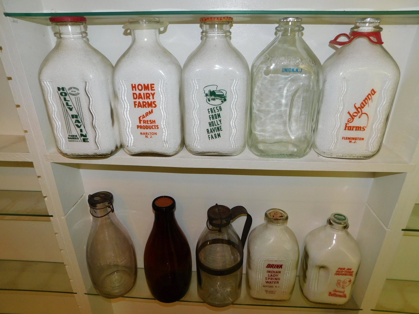 Lot of 10 NJ Dairy Bottles: Lot of 10 NJ Dairy Bottles including Ag Smalley & Co. - Boston, Amber 2 Qt Bottle, Amethyst 2 Qt Bottle, Home Dairy Farms - Marlton, Johanna Farms - Flemington, Ideal Dairy - Union, Indian Lady Spring