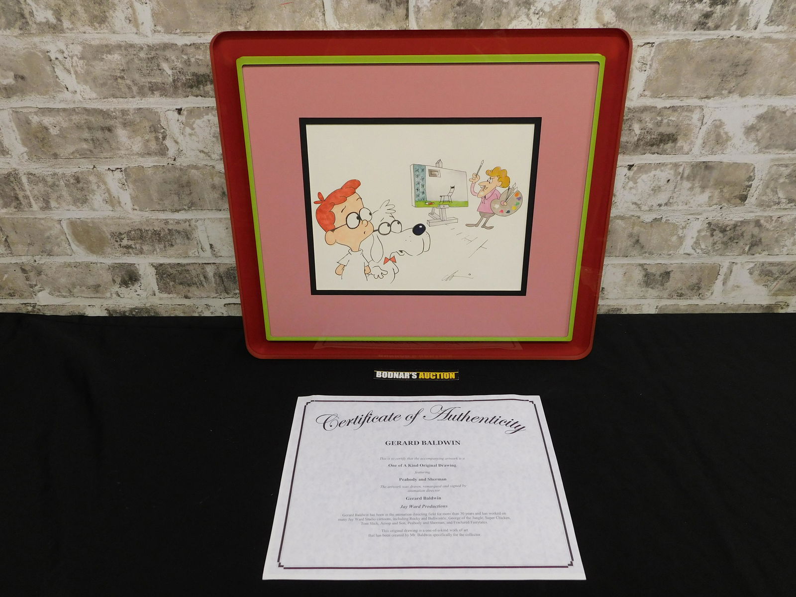 Rocky & Bullwinkle One of a Kind Drawing: Rocky & Bullwinkle One of a Kind Drawing featuring Peabody and Sherman. Signed by Gerard Baldwin. Comes with COA. Professionally framed and matted. Lucite Frame. Measures 16.5" wide x 14.5" tall. Plea