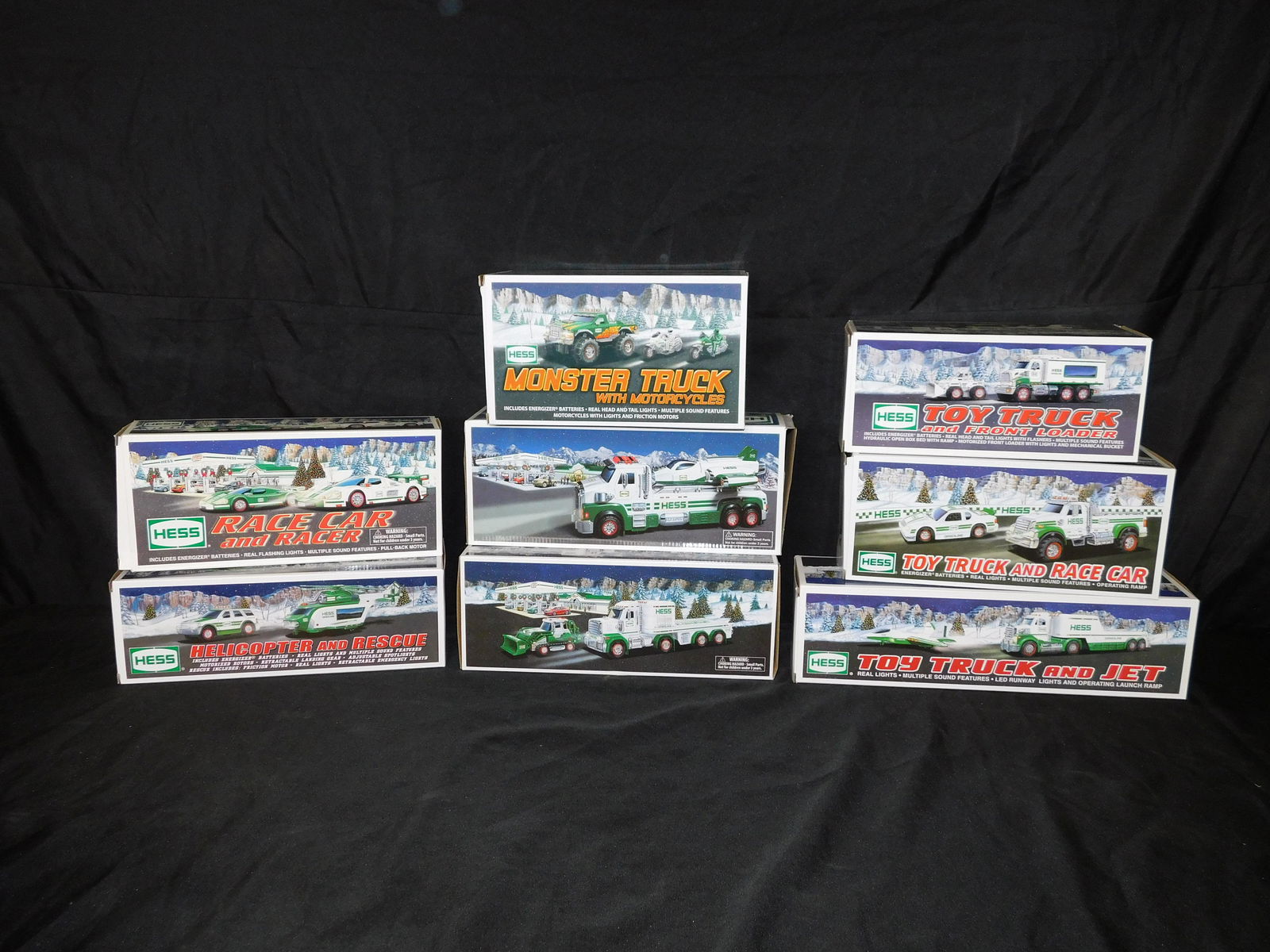 Lot of 8 Hess Trucks: Lot of 8 Hess Trucks including Years 2007 - 2014. Please read the terms and conditions. This sale will be broadcast live on sale day with full descriptions of each lot being sold. All items MUST be pa