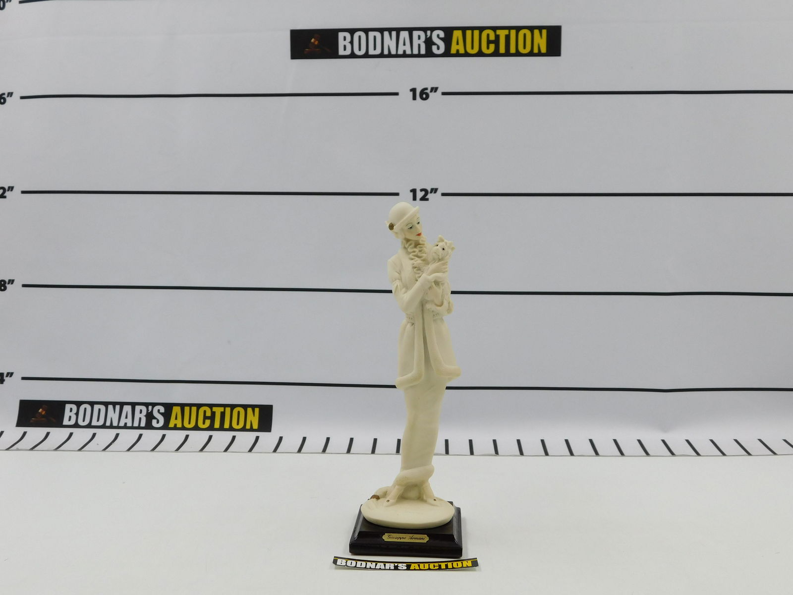 Lady With Yorkie Giuseppe Armani Figurine: Giuseppe Armani Lady with Yorkie Dog, #0421F. Measures approx. 10" tall x 3" wide. All invoices must be paid within 24 hours of the sale. All items are shipped USPS or UPS and will be billed separatel