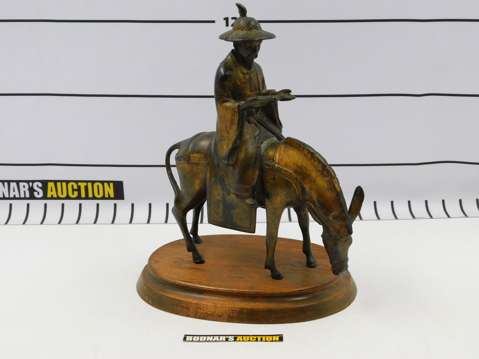 Bronze and Metal Statue of Man Riding a Donkey (1 of 11)