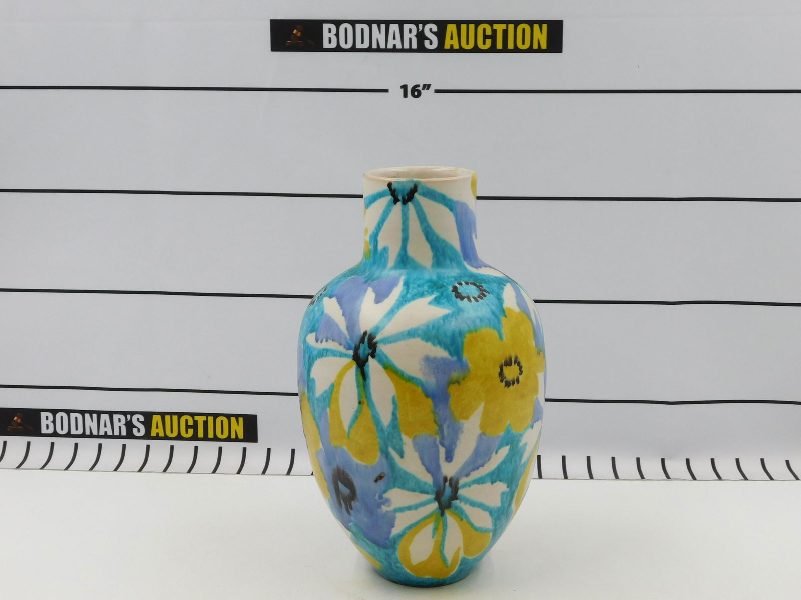 Italian Art Pottery Vase - Flower Decoration: Italian art pottery tall vase with flower decoration marked R.1907 Raymor Italy. Measures approx. 13" tall, 8" wide. All invoices must be paid within 24 hours of the sale. All items are shipped with L